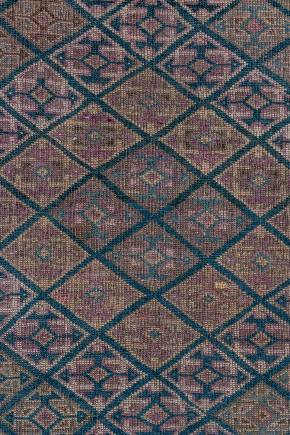 4' x 7' one-of-a-kind handmade antique Qashqai rug. Color palette: taupe, indigo, mauve, dusty rose, ivory, slate, camel