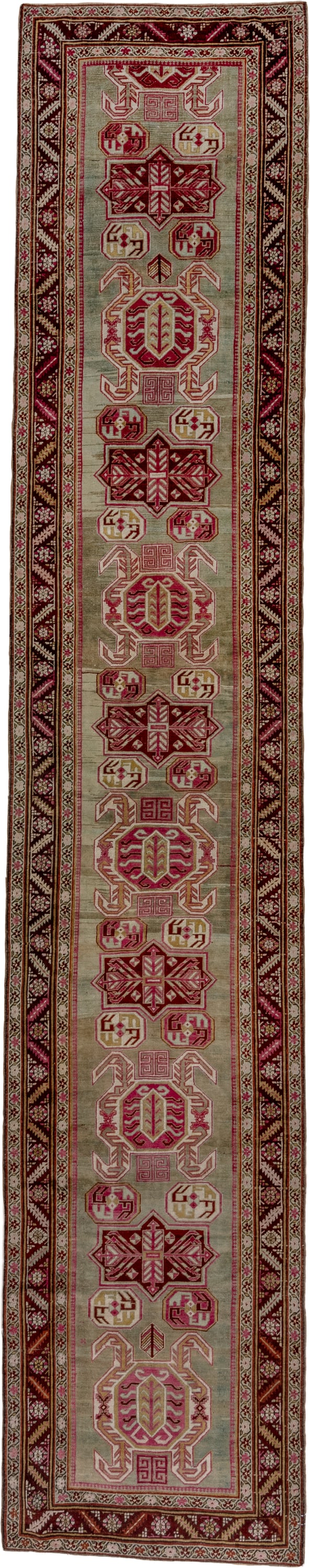 3' x 17' one-of-a-kind handmade antique Caucasian runner rug. Color palette: ivory, burgundy, rose, brown, taupe, crimson