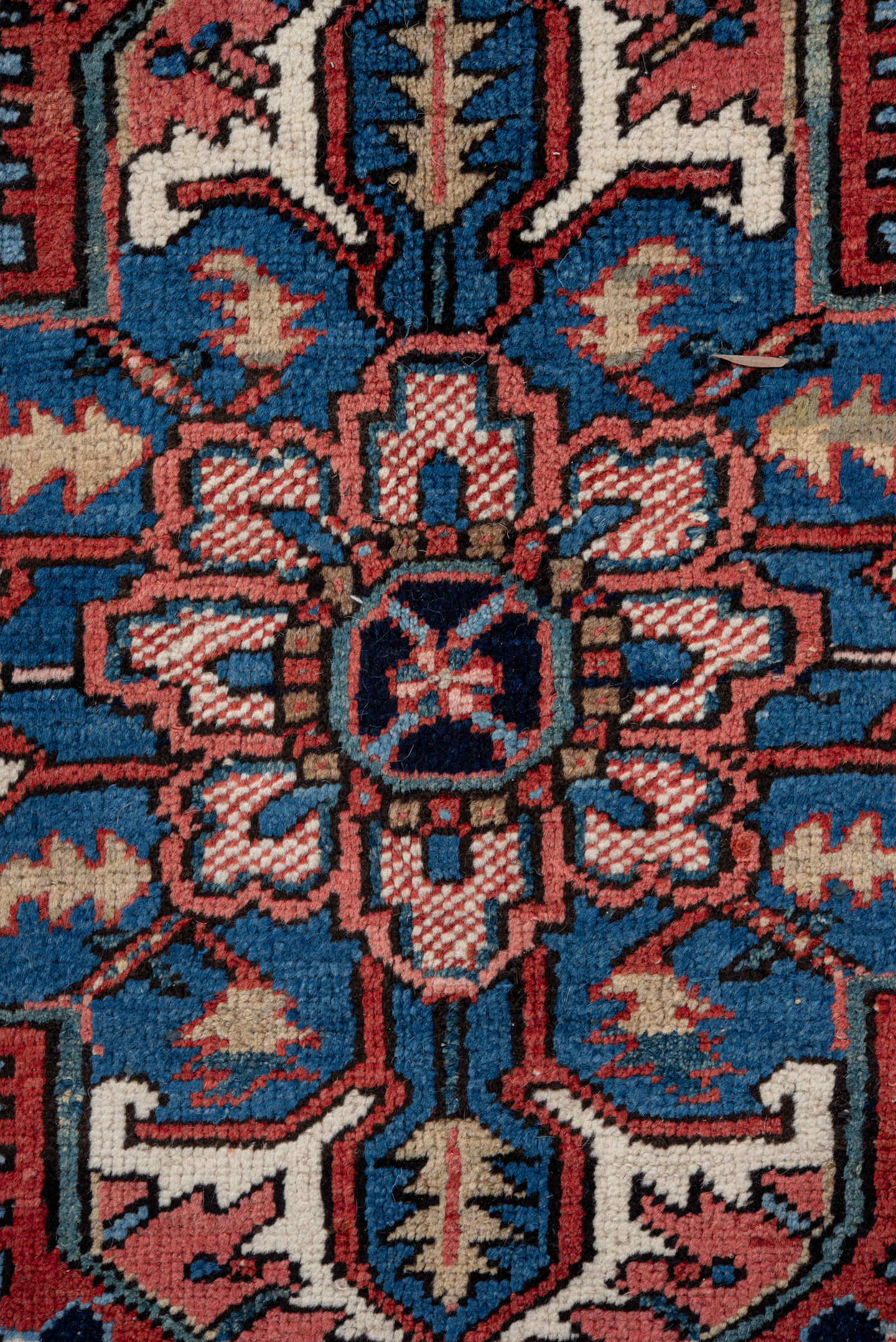 7' x 10' one-of-a-kind handmade antique Heriz large size rug. Color palette: rust, navy, ivory, sky_blue, coral, camel