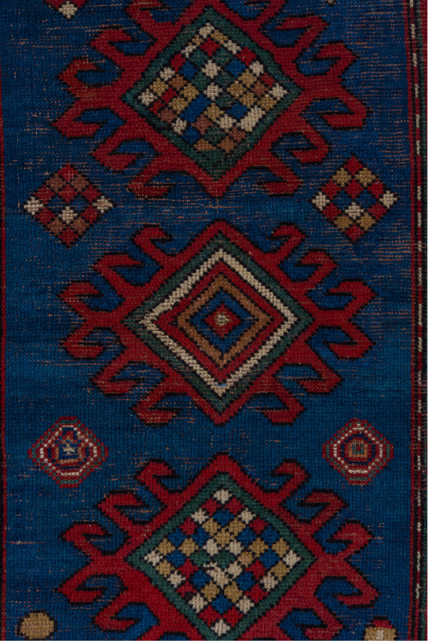 3' x 6' one-of-a-kind handmade vintage Kazak small size rug. Color palette: blue, brown, gray, pink, red