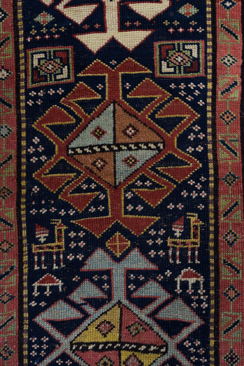3' x 11' one-of-a-kind handmade vintage Caucasian runner rug. Color palette: navy, ivory, rust, rose, soft blue, taupe