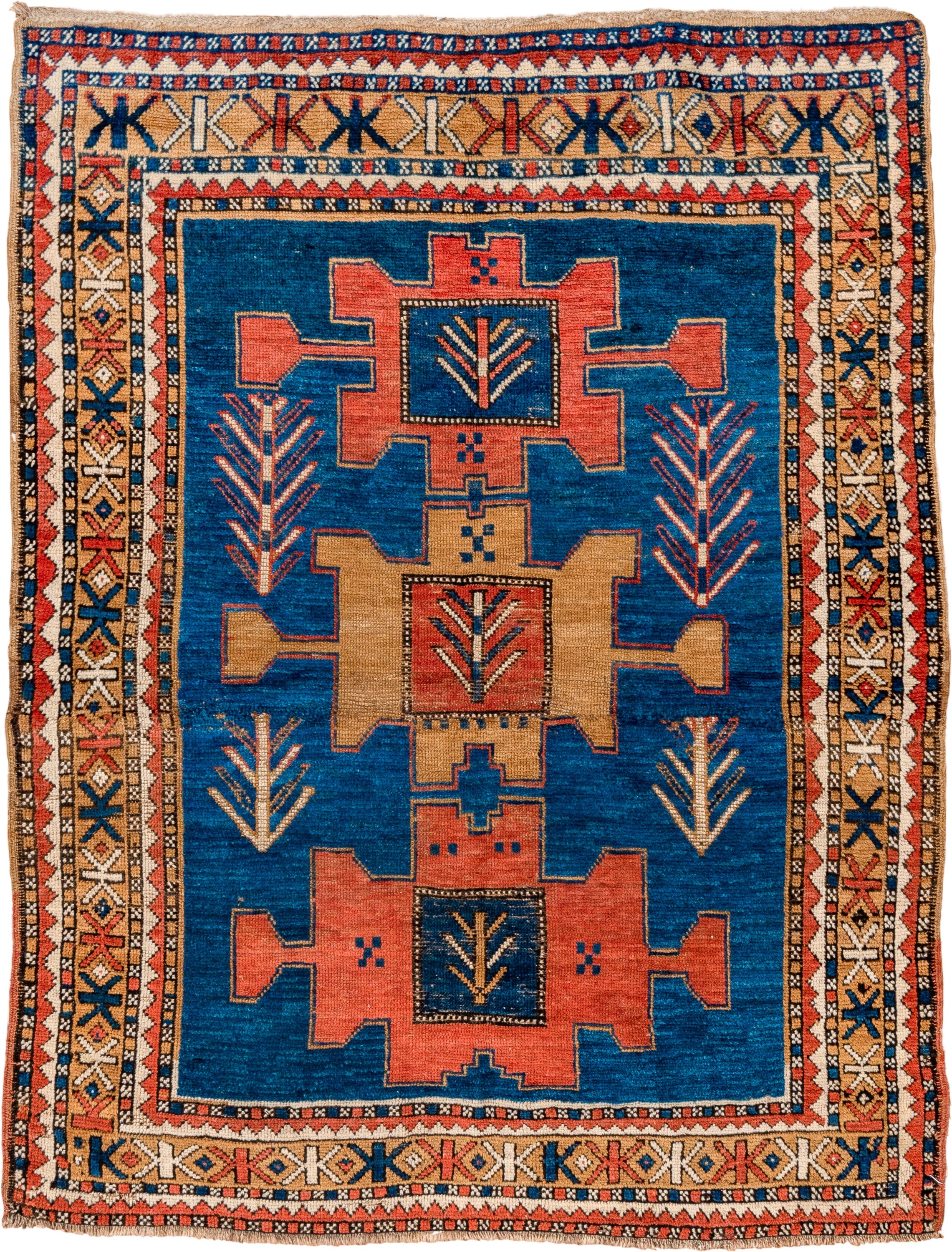 4' x 5' one-of-a-kind handmade antique Kazak small size rug. Color palette: blue, ivory, rust, navy, camel, coral