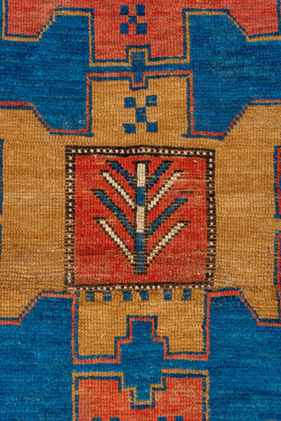 4' x 5' one-of-a-kind handmade antique Kazak small size rug. Color palette: blue, ivory, rust, navy, camel, coral