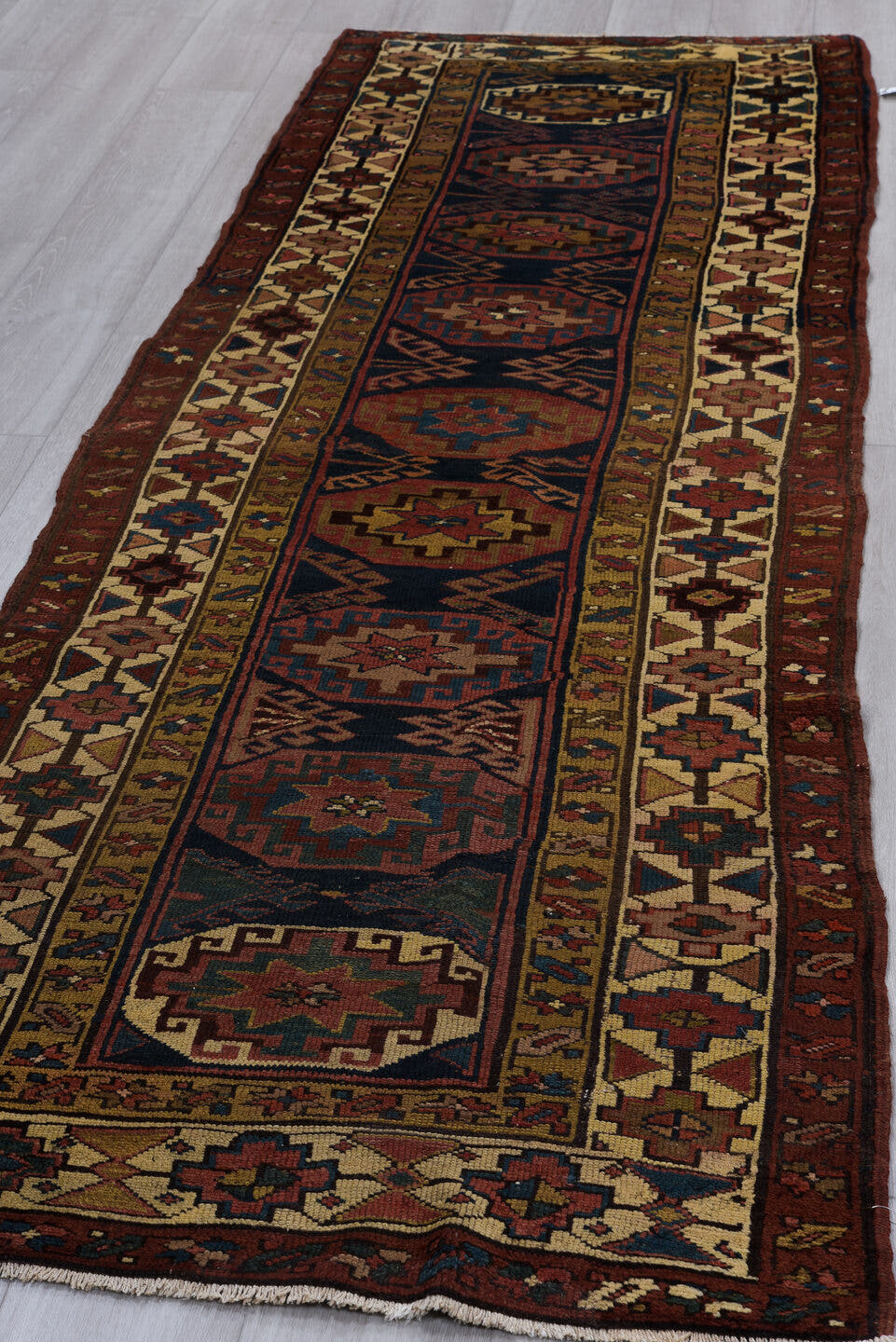 3' x 9' one-of-a-kind handmade vintage NW Persian runner rug. Color palette: navy, rust, ivory, camel, rose, teal, brown