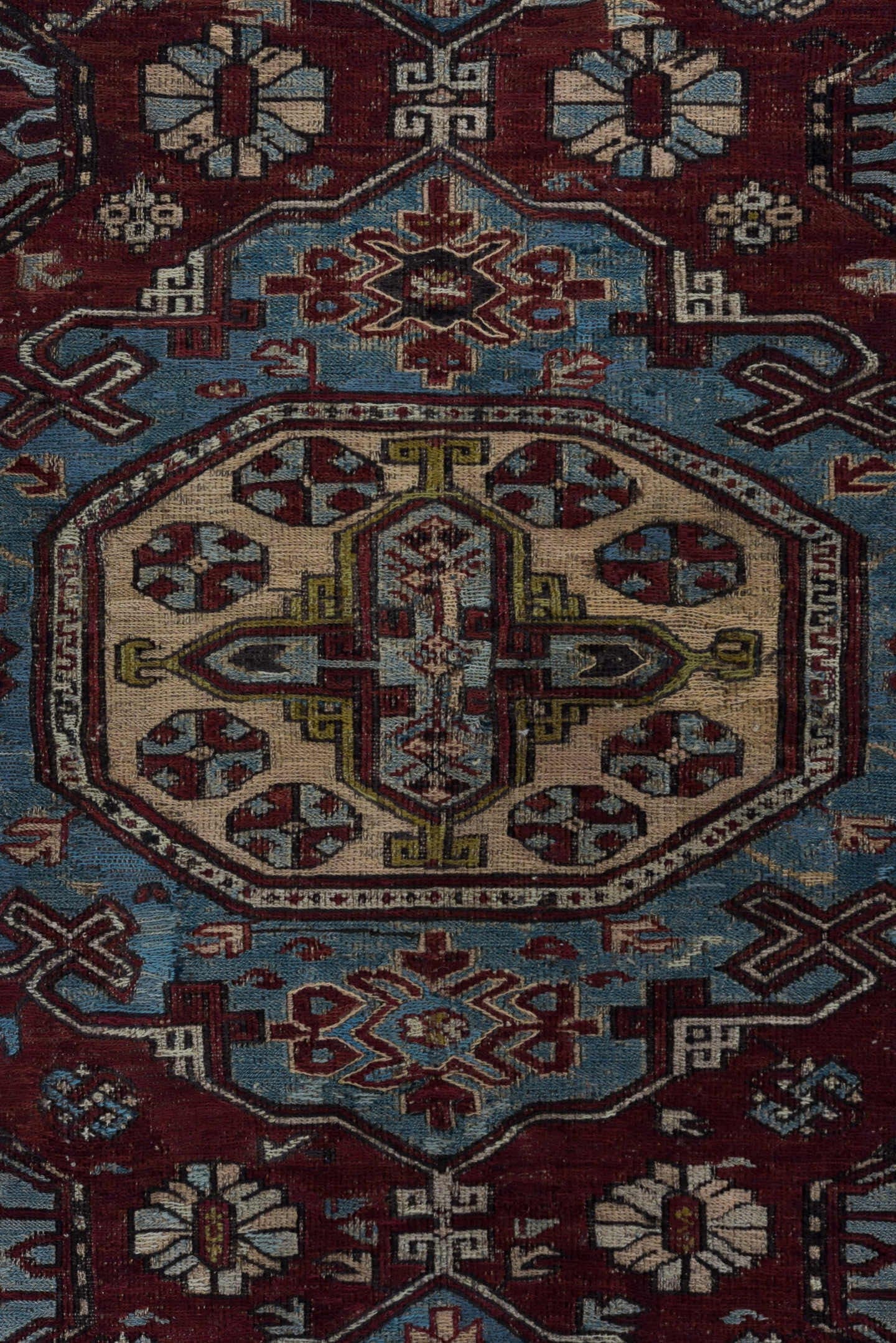 4' x 6' one-of-a-kind handmade antique Sumak rug. Color palette: rust, powder blue, ivory, charcoal, burgundy, camel, slate