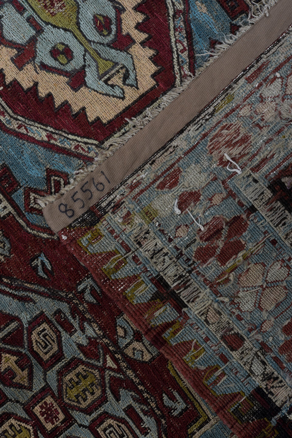 4' x 6' one-of-a-kind handmade antique Sumak rug. Color palette: rust, powder blue, ivory, charcoal, burgundy, camel, slate