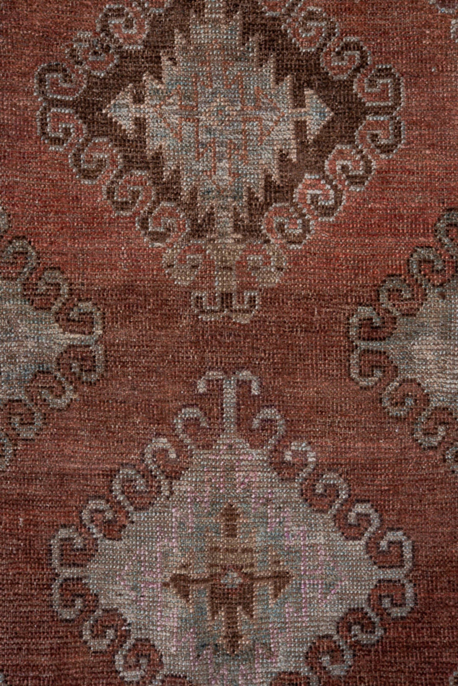 4' x 7' one-of-a-kind handmade antique Belouch rug. Color palette: rust, brown, taupe, ivory, charcoal, rose, slate