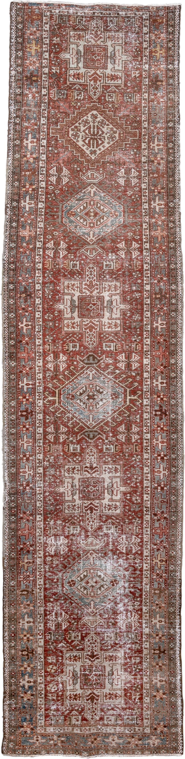 2' x 11' one-of-a-kind handmade antique Karaje runner rug. Color palette: rust, ivory, soft blue, terra cotta, brown, slate