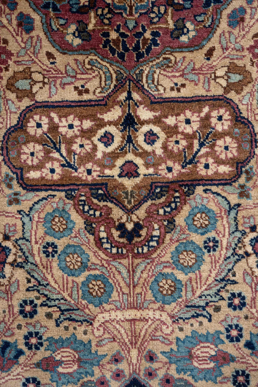 6' x 9' one-of-a-kind handmade antique Kerman medium size rug. Color palette: ivory, navy, turquoise, burgundy, rose, camel