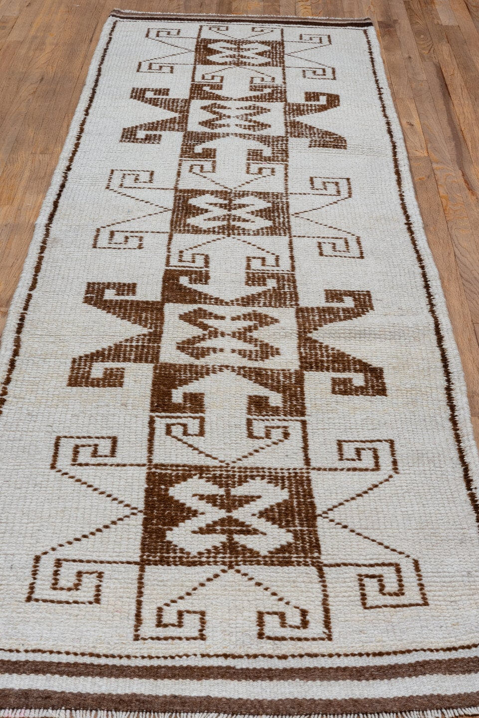 3' x 10' one-of-a-kind handmade antique Kars runner rug. Color palette: ivory, brown, taupe, beige, gray