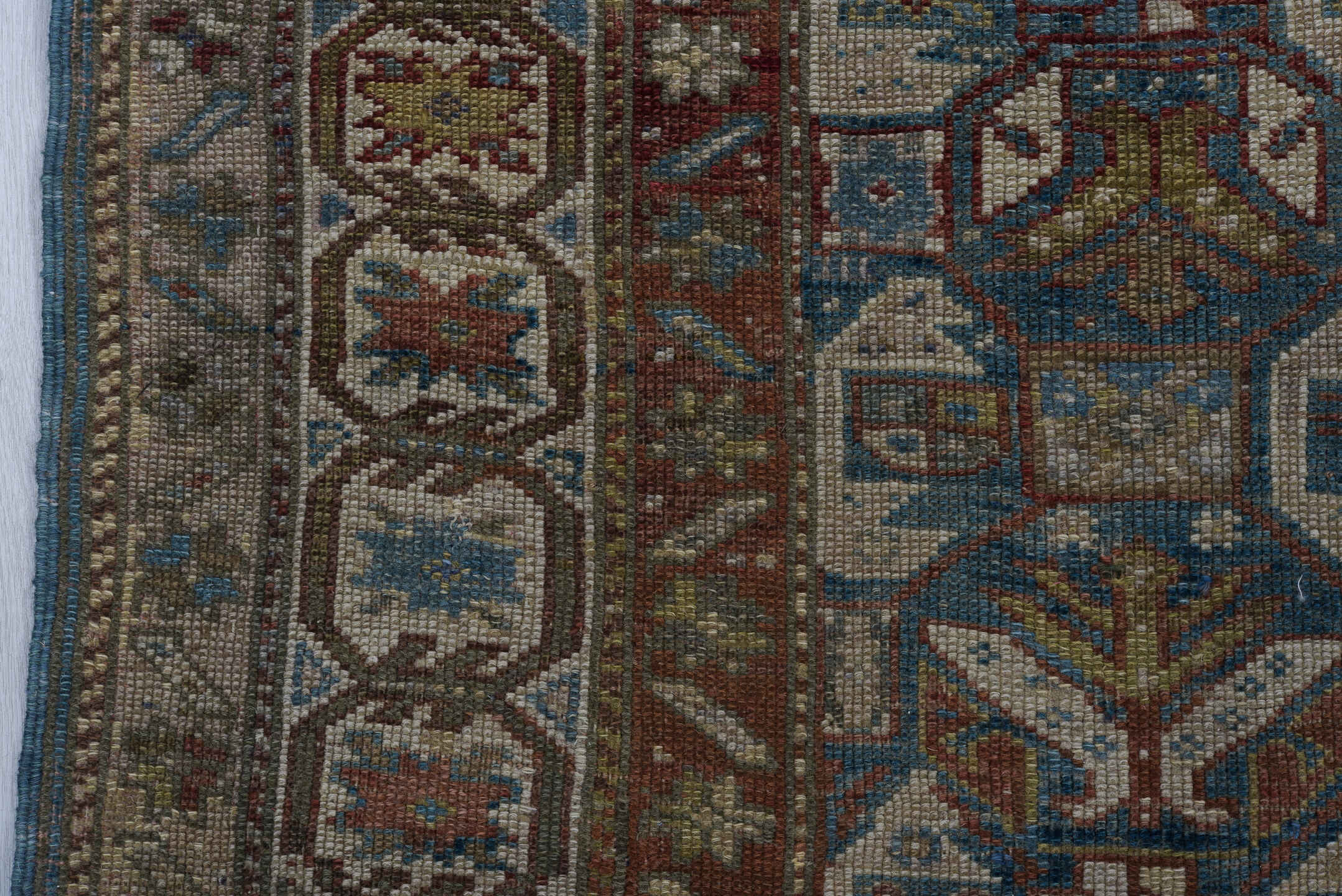 3' x 5' one-of-a-kind handmade vintage Caucasian small size rug. Color palette: ivory, brown, blue, rust, taupe, burgundy
