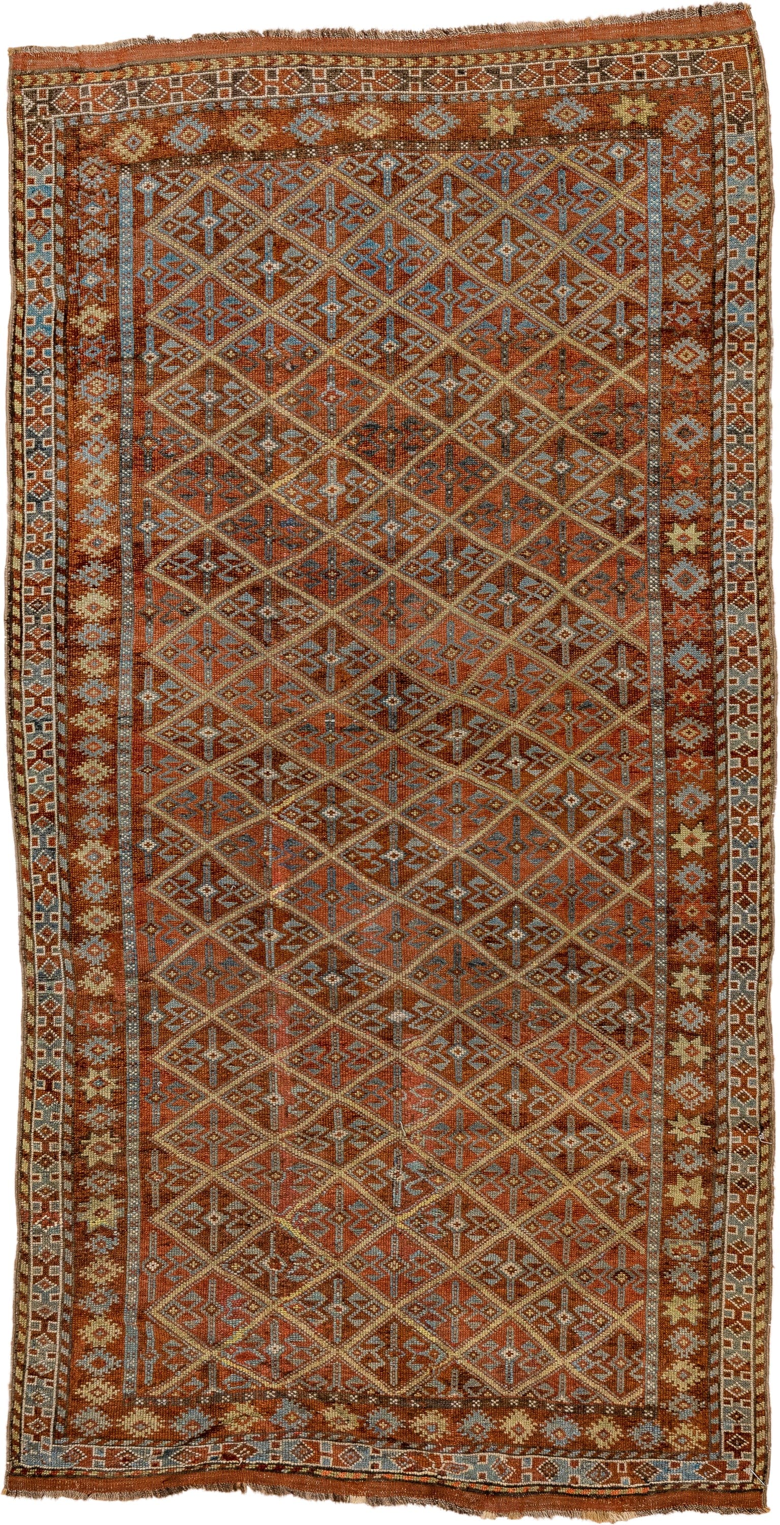 4' x 8' one-of-a-kind handmade antique Kurd rug. Color palette: rust, camel, ivory, sky blue, brown, taupe, gold, terracotta