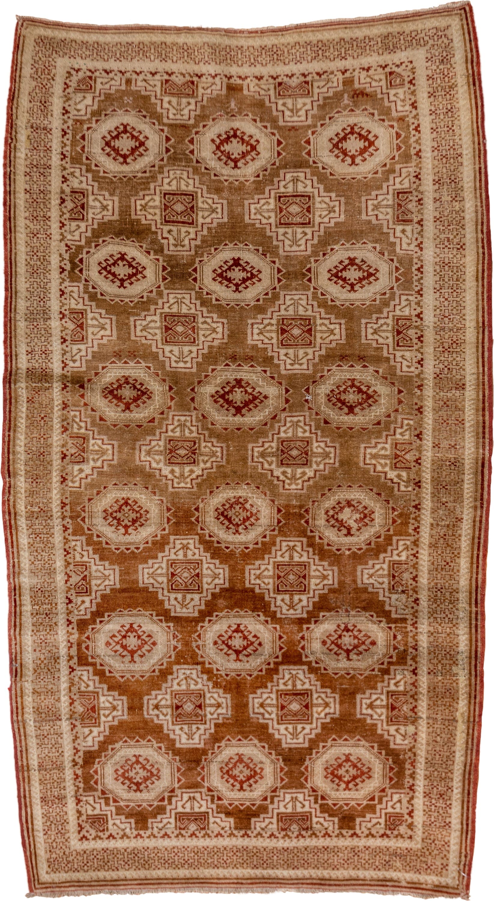 3' x 6' one-of-a-kind handmade antique Belouch rug. Color palette: camel, ivory, rust, terra cotta, tan, sienna, beige