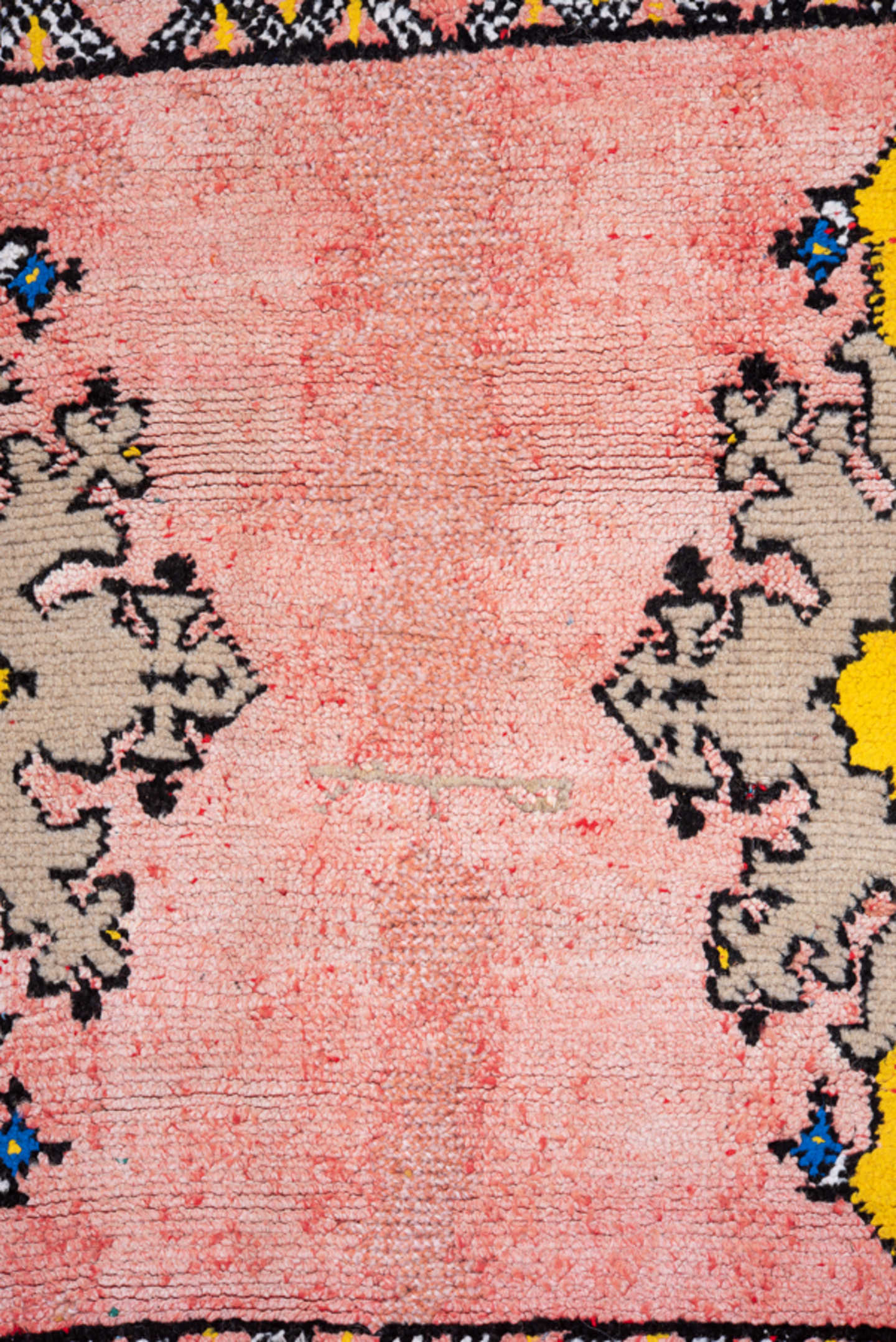 4' x 6' one-of-a-kind handmade vintage Moroccan small size rug. Color palette: pink, yellow, charcoal, taupe, blue, ivory