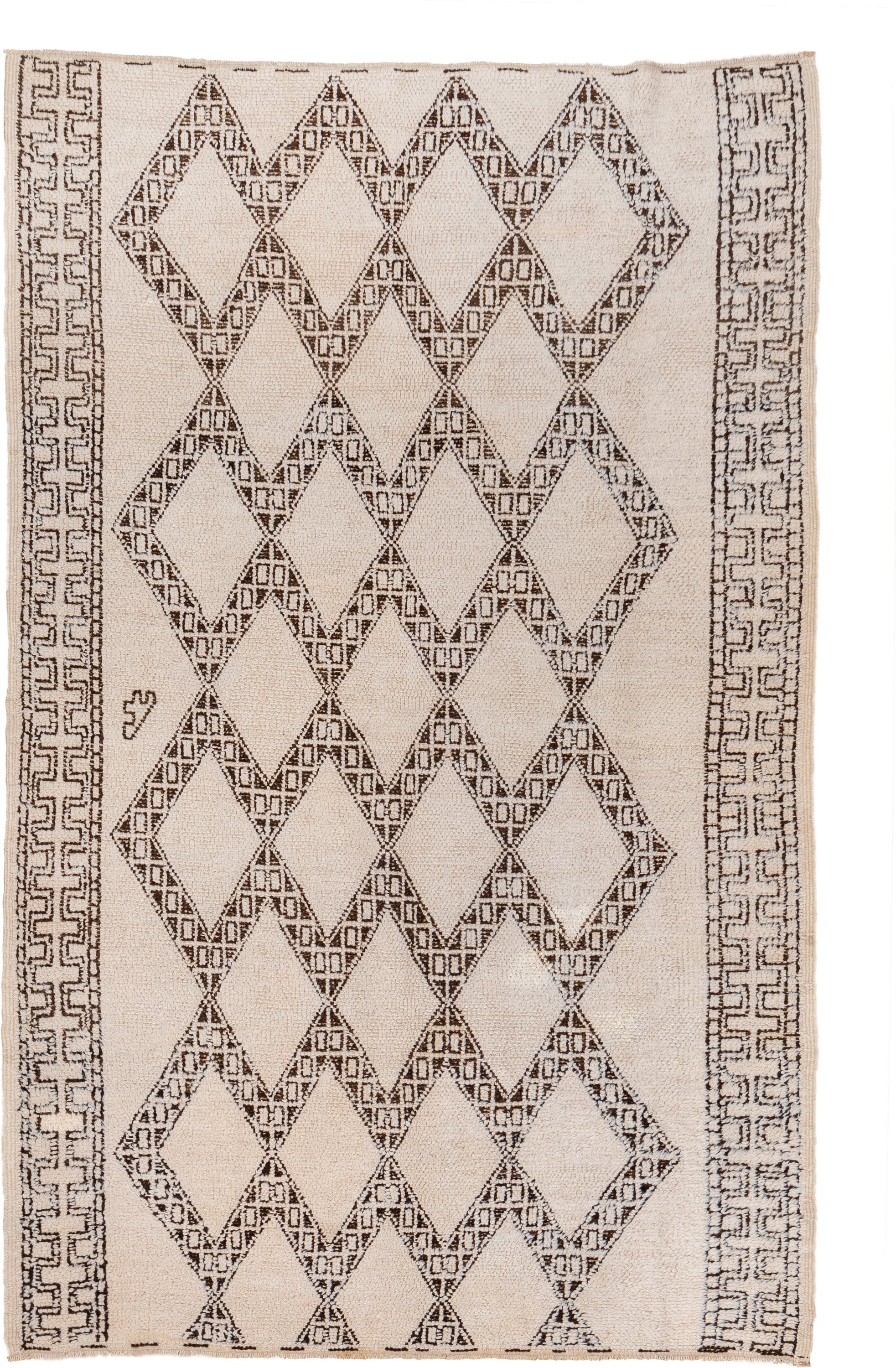 5' x 8' one-of-a-kind handmade vintage Moroccan medium size rug. Color palette: ivory, brown, taupe, beige, gray