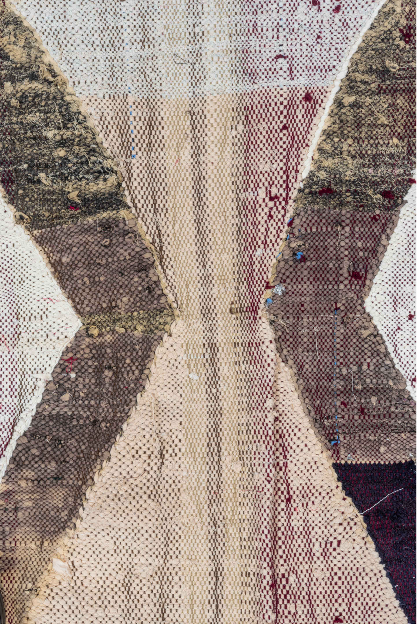 4' x 8' one-of-a-kind handmade vintage Rag Rug rug. Color palette: ivory, charcoal, plum, crimson, lavender, sky blue, brown