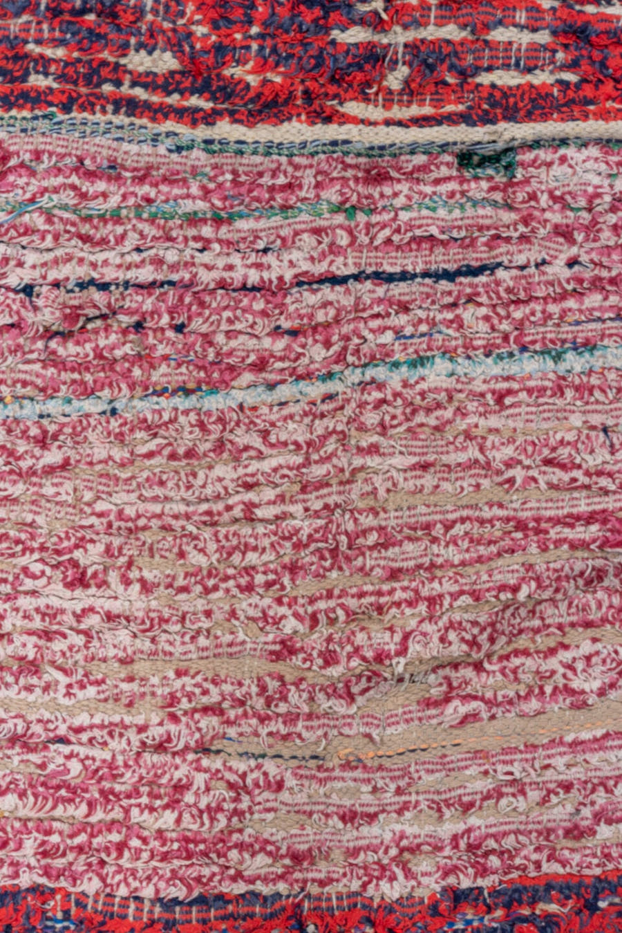 3' x 8' one-of-a-kind handmade vintage Rag Rug runner rug. Color palette: crimson, ivory, red, aqua, navy, rose, teal, blue
