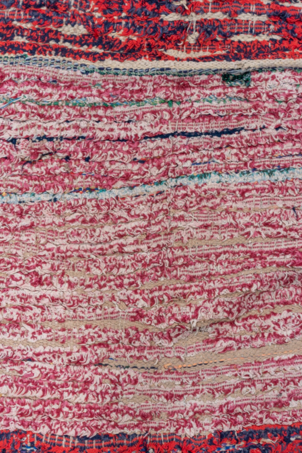 3' x 8' one-of-a-kind handmade vintage Rag Rug runner rug. Color palette: crimson, ivory, red, aqua, navy, rose, teal, blue