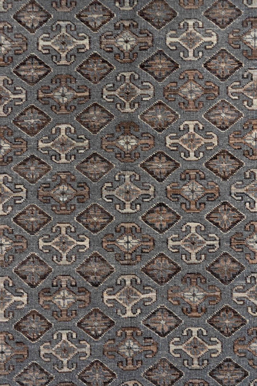 4' x 6' one-of-a-kind handmade vintage Khotan small size rug. Color palette: taupe, ivory, brown, charcoal, camel, greige