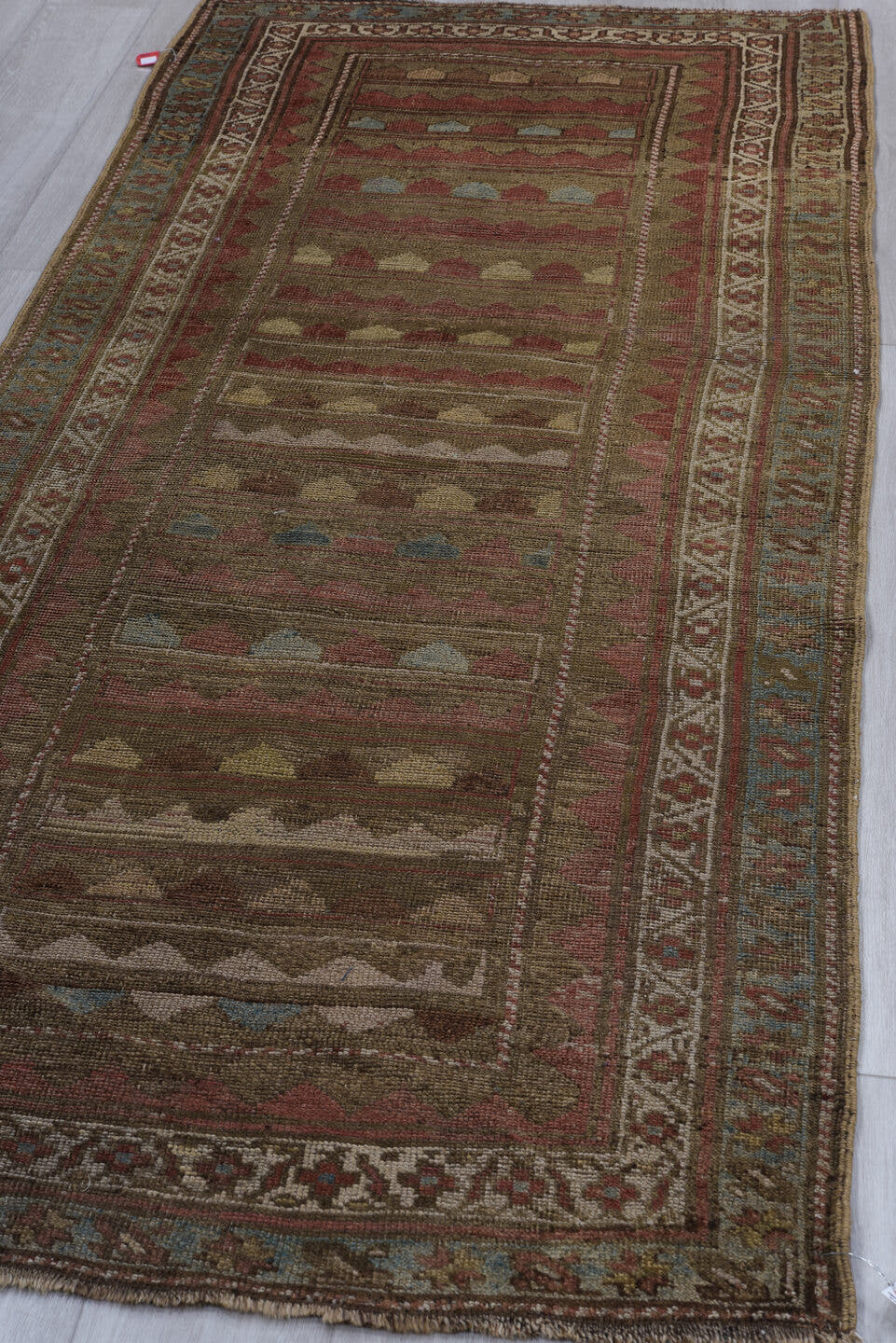 3' x 8' one-of-a-kind handmade vintage Caucasian runner rug. Color palette: taupe, rust, ivory, soft blue, brown, terracotta