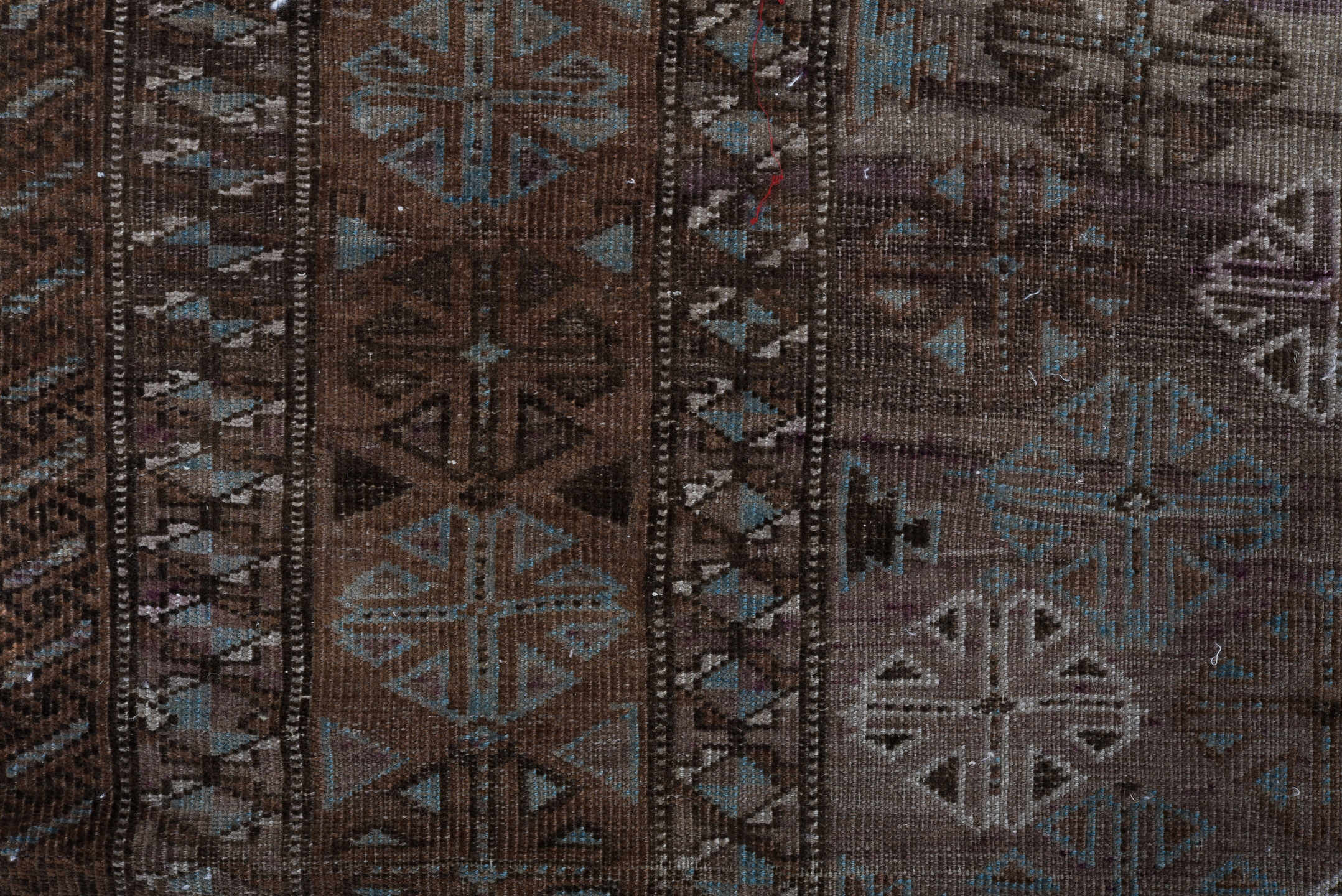 5' x 8' one-of-a-kind handmade vintage Belouch medium size rug. Color palette: brown, taupe, ivory, charcoal, slate, camel