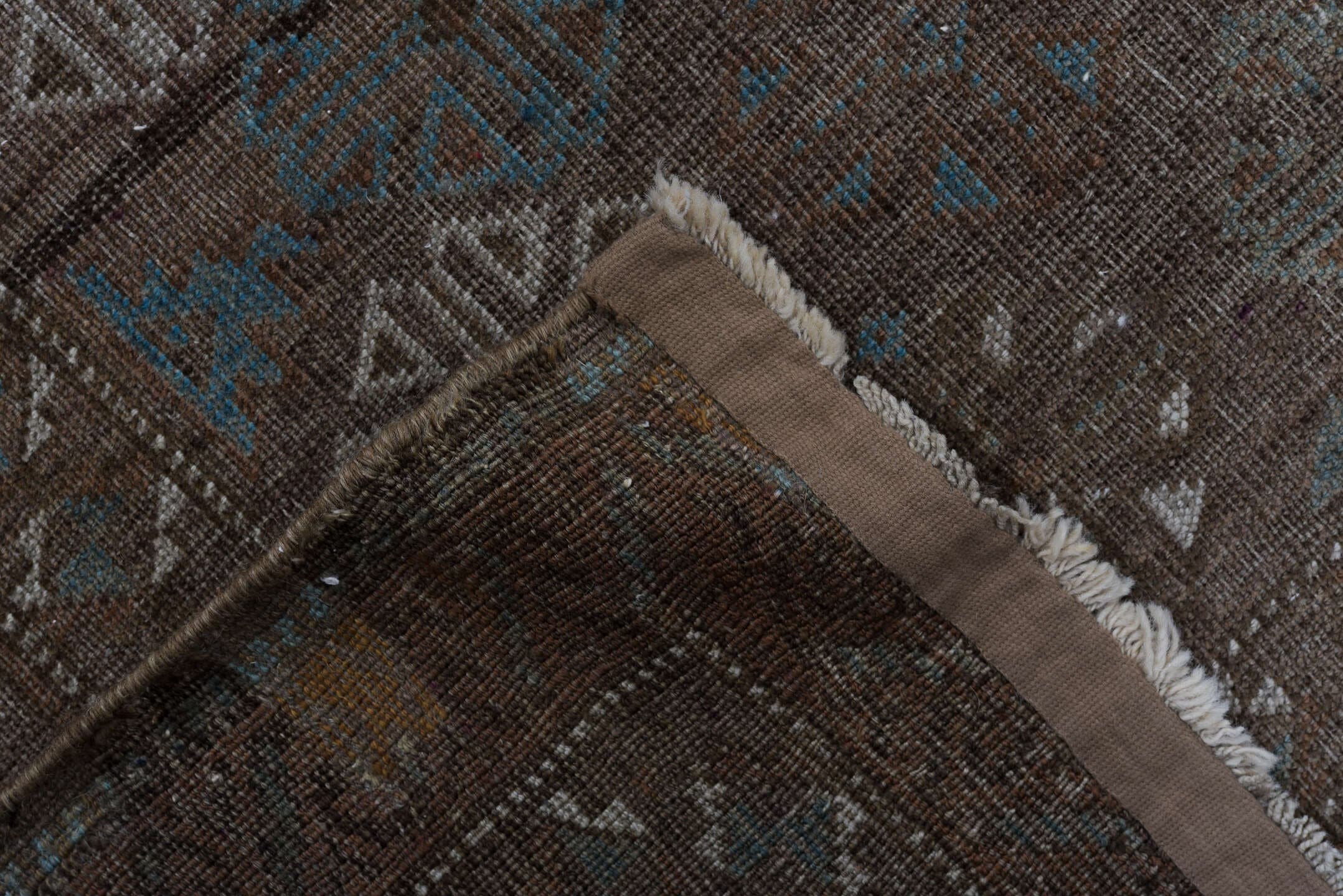 5' x 8' one-of-a-kind handmade vintage Belouch medium size rug. Color palette: brown, taupe, ivory, charcoal, slate, camel