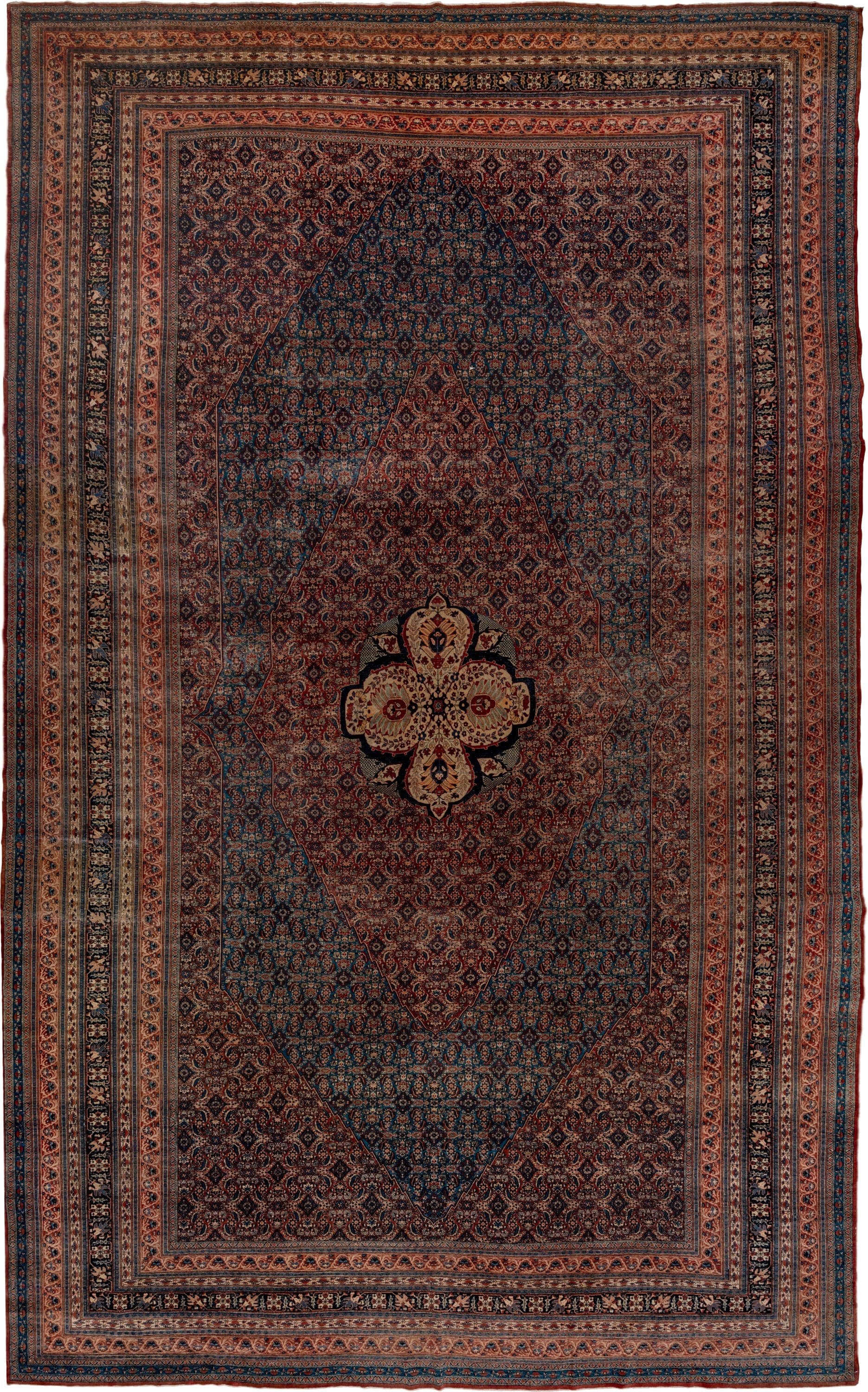 12' x 19' one-of-a-kind handmade antique Tabriz oversize rug. Color palette: navy, rust, ivory, terra cotta, indigo, camel