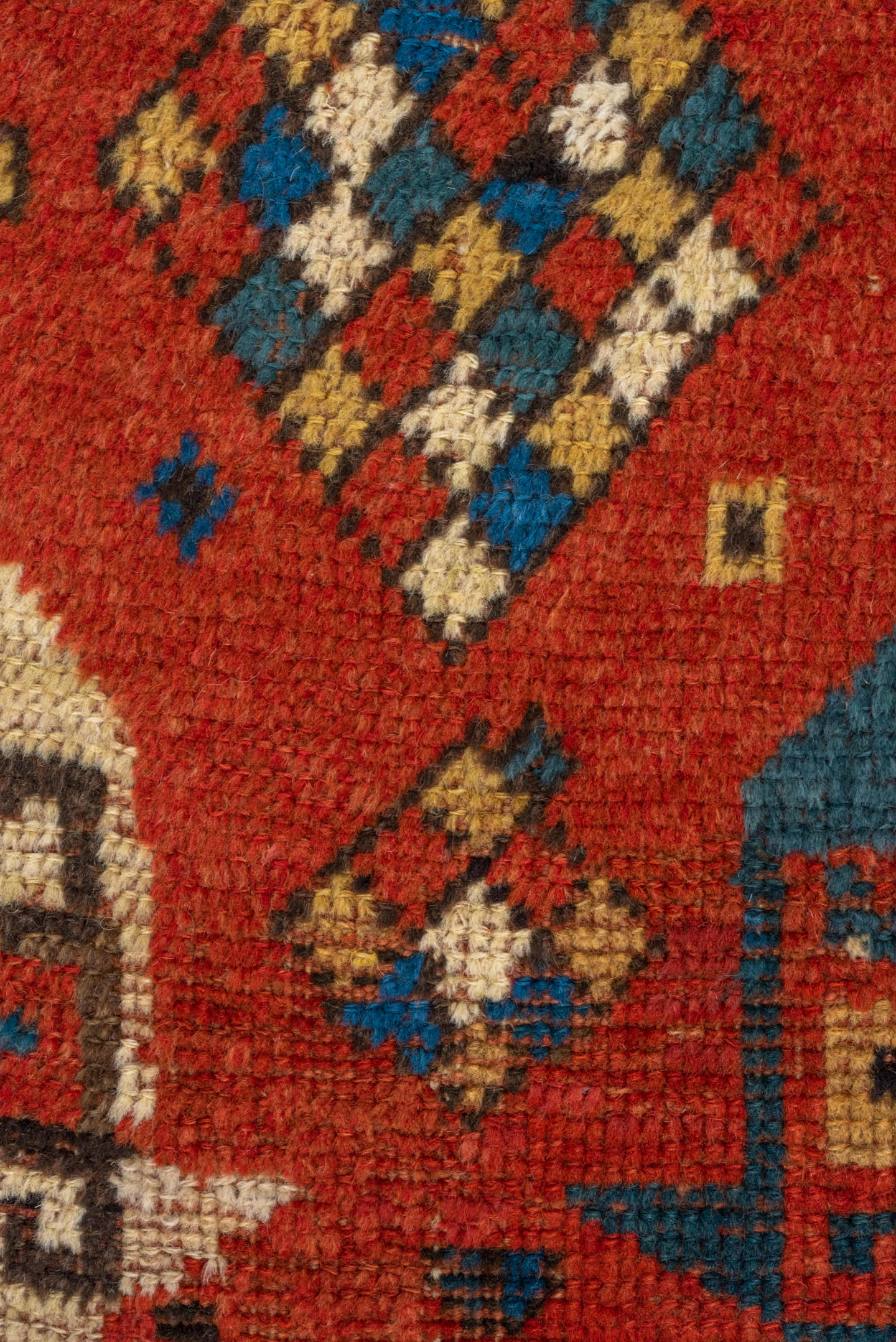 4' x 7' one-of-a-kind handmade antique Kazak rug. Color palette: rust, cobalt, ivory, camel, charcoal, gold, crimson