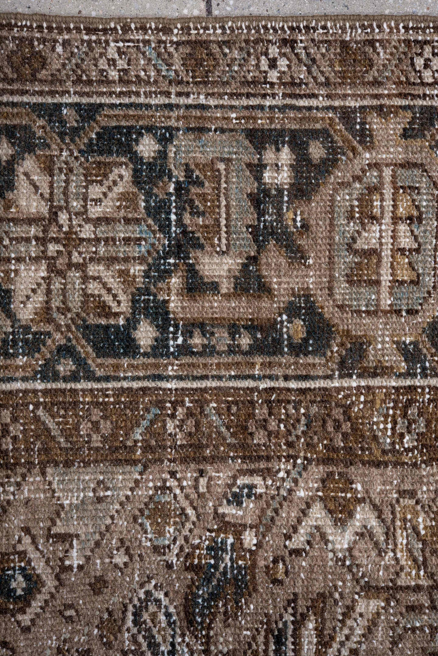 7' x 10' one-of-a-kind handmade antique Heriz large size rug. Color palette: taupe, brown, ivory, charcoal, beige, slate