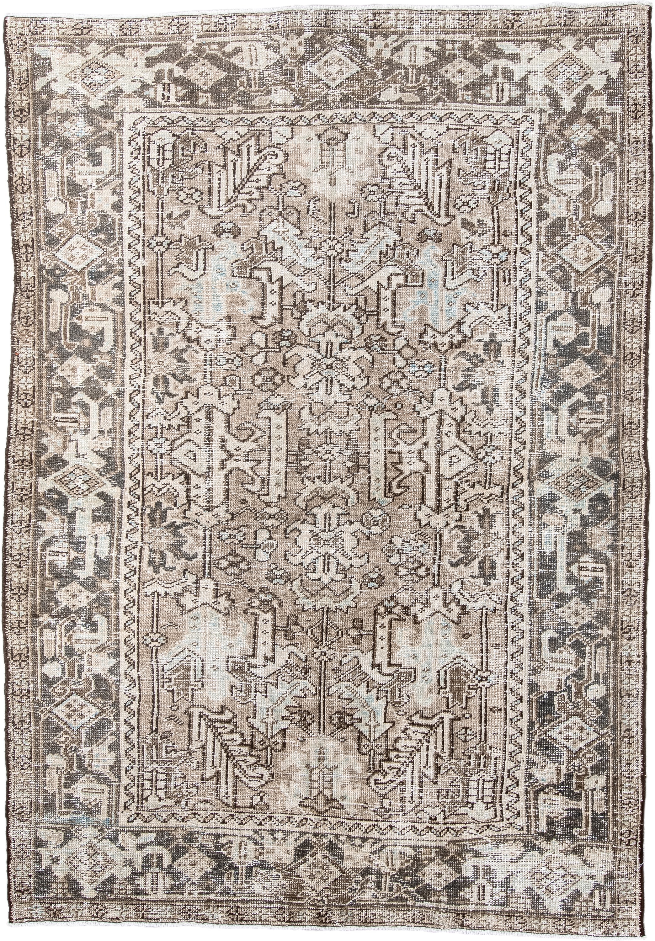 5' x 8' one-of-a-kind handmade antique Heriz medium size rug. Color palette: taupe, ivory, charcoal, brown, pale blue, cream