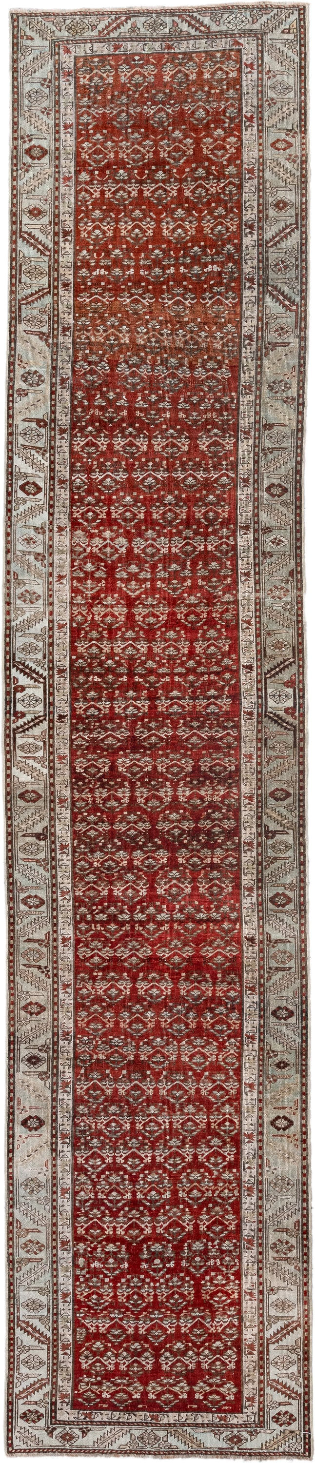 2' x 14' one-of-a-kind handmade antique Caucasian runner rug. Color palette: rust, ivory, crimson, brown, charcoal