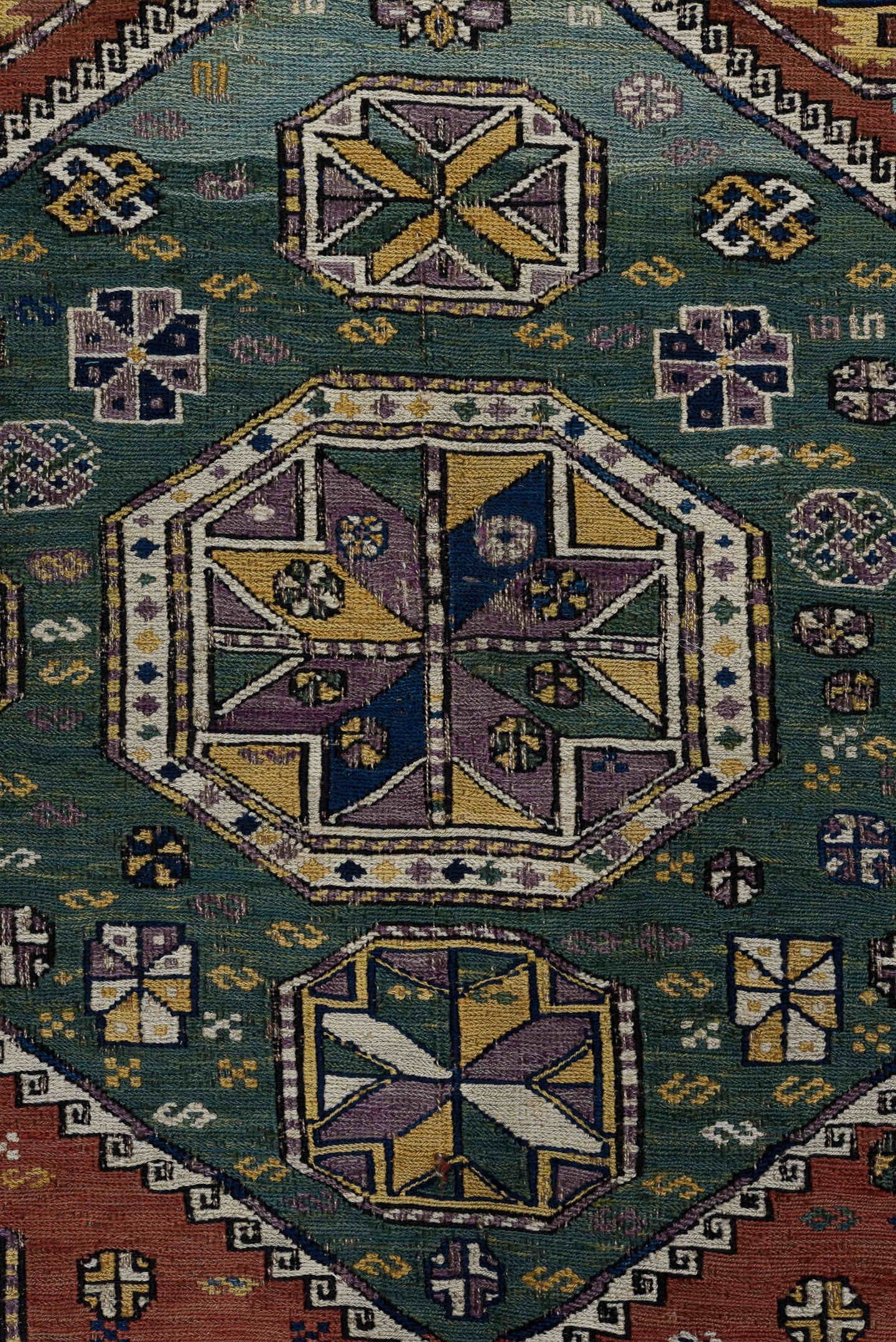 5' x 9' one-of-a-kind handmade vintage Sumak medium size rug. Color palette: rust, navy, ivory, sage, camel, charcoal