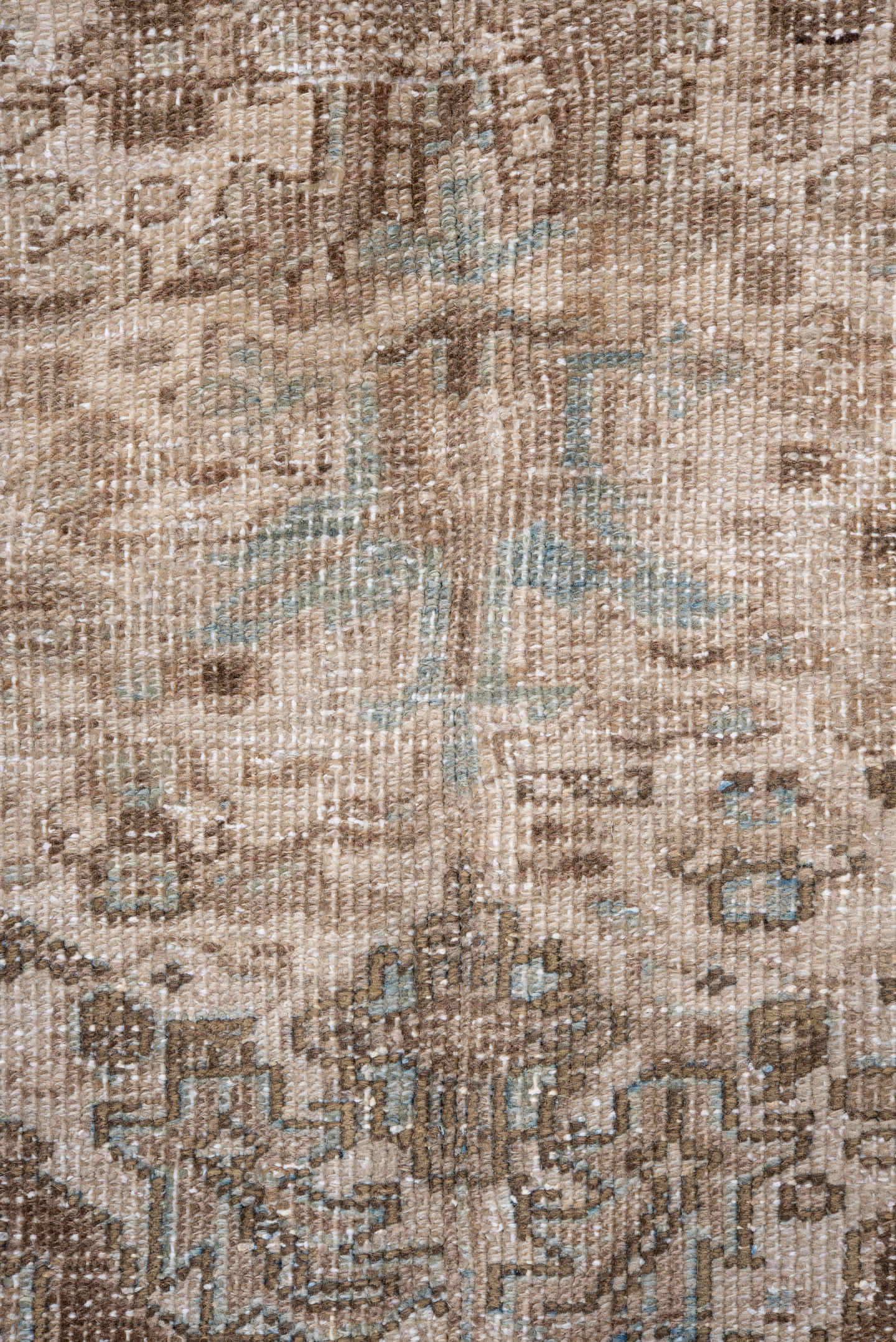 7' x 9' one-of-a-kind handmade antique Heriz rug. Color palette: taupe, brown, ivory, pale blue, beige, gray, light blue