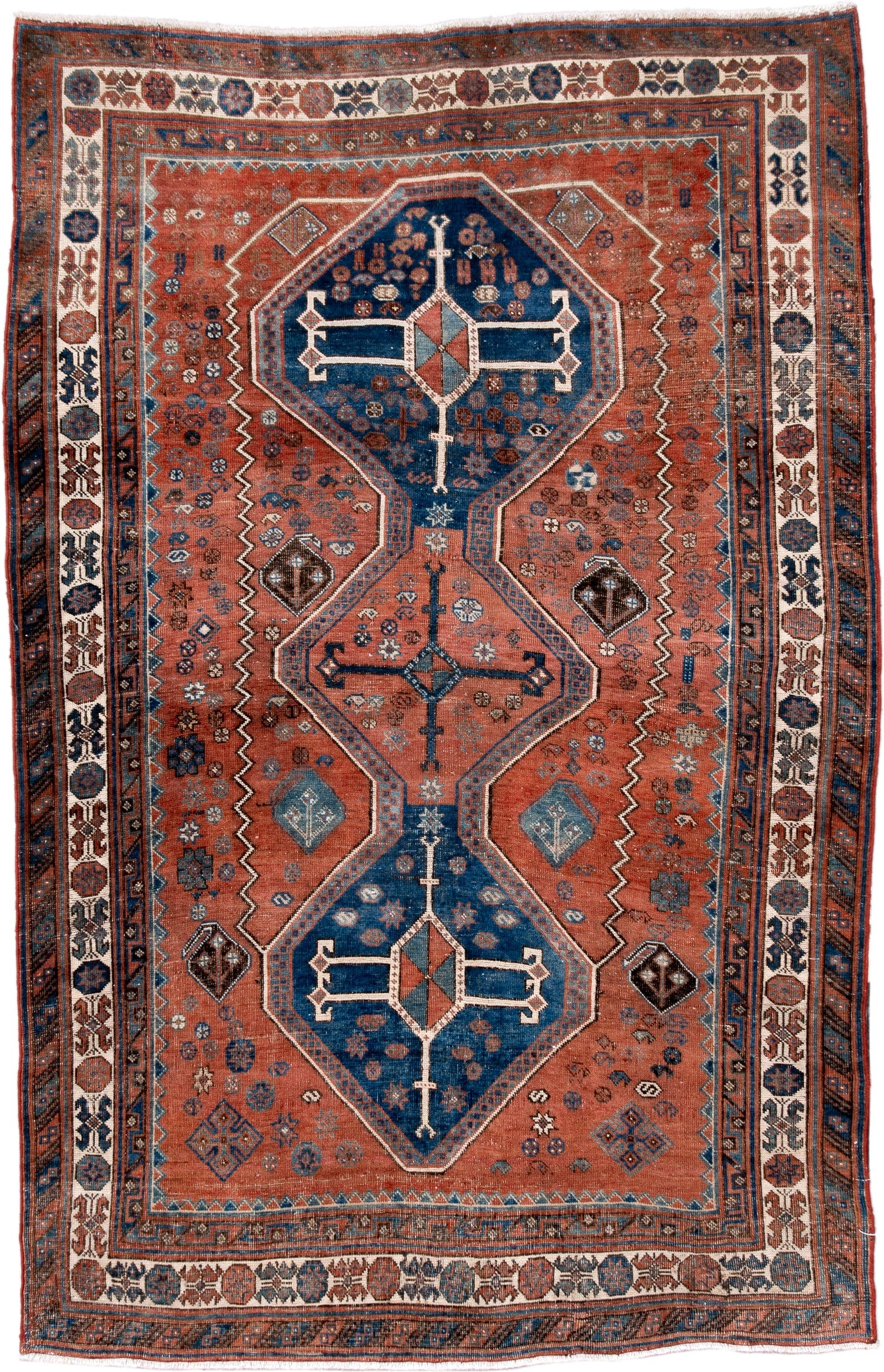 4' x 6' one-of-a-kind handmade antique Afshar small size rug. Color palette: terra cotta, indigo, ivory, rust, slate, camel