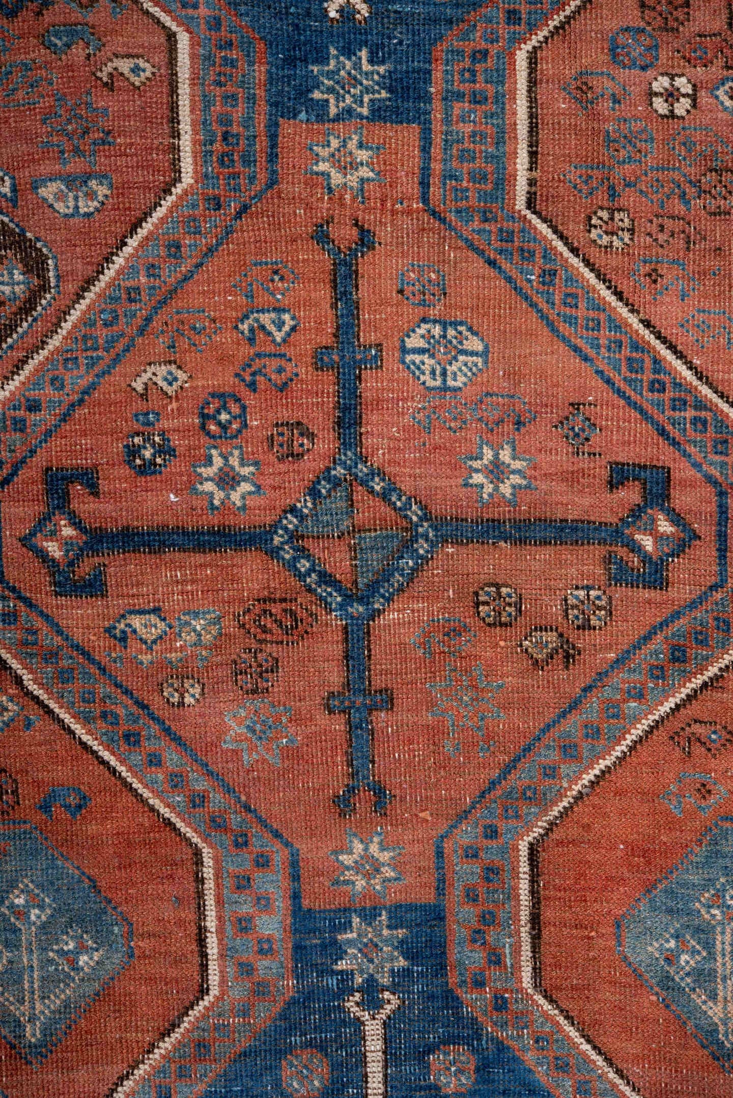 4' x 6' one-of-a-kind handmade antique Afshar small size rug. Color palette: terra cotta, indigo, ivory, rust, slate, camel