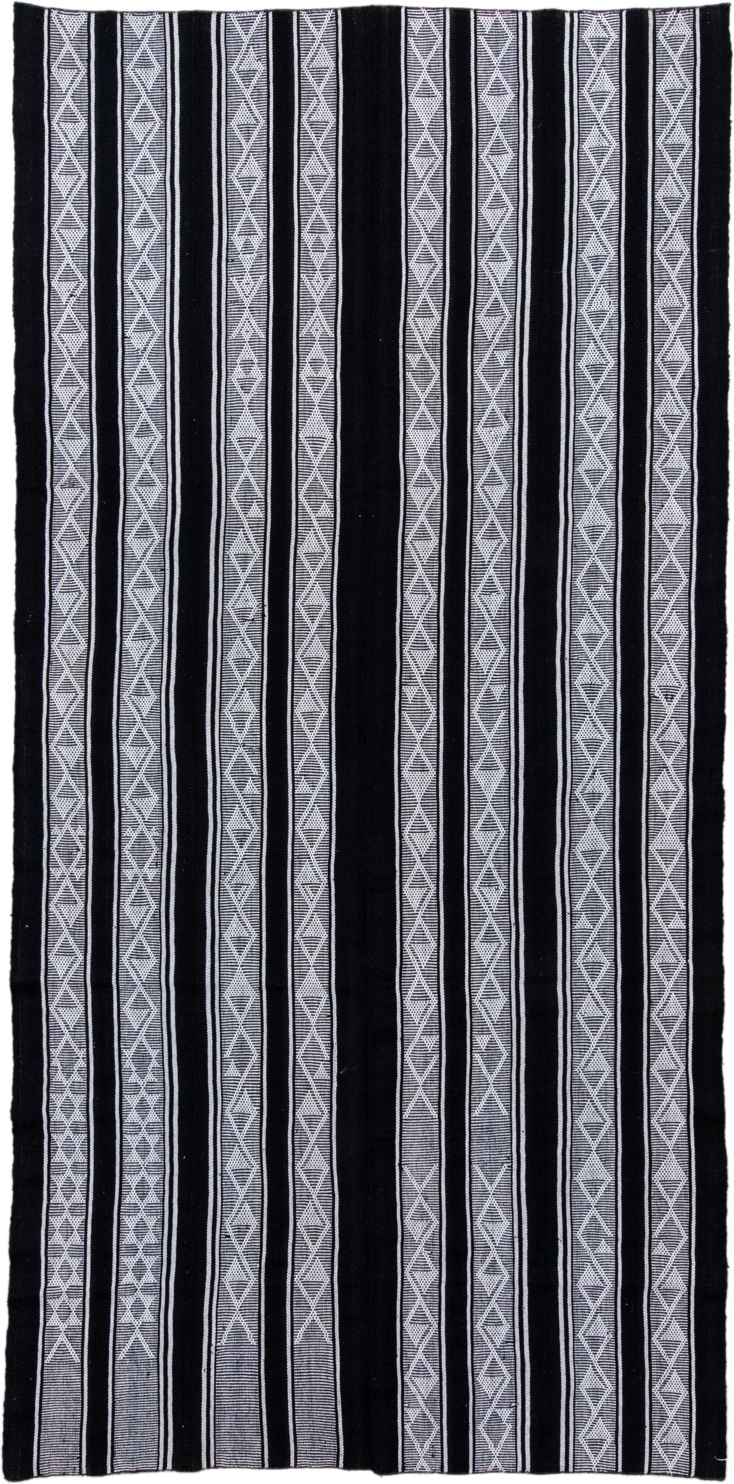 5' x 11' one-of-a-kind handmade antique Flatweave rug. Color palette: black, ivory, charcoal, gray