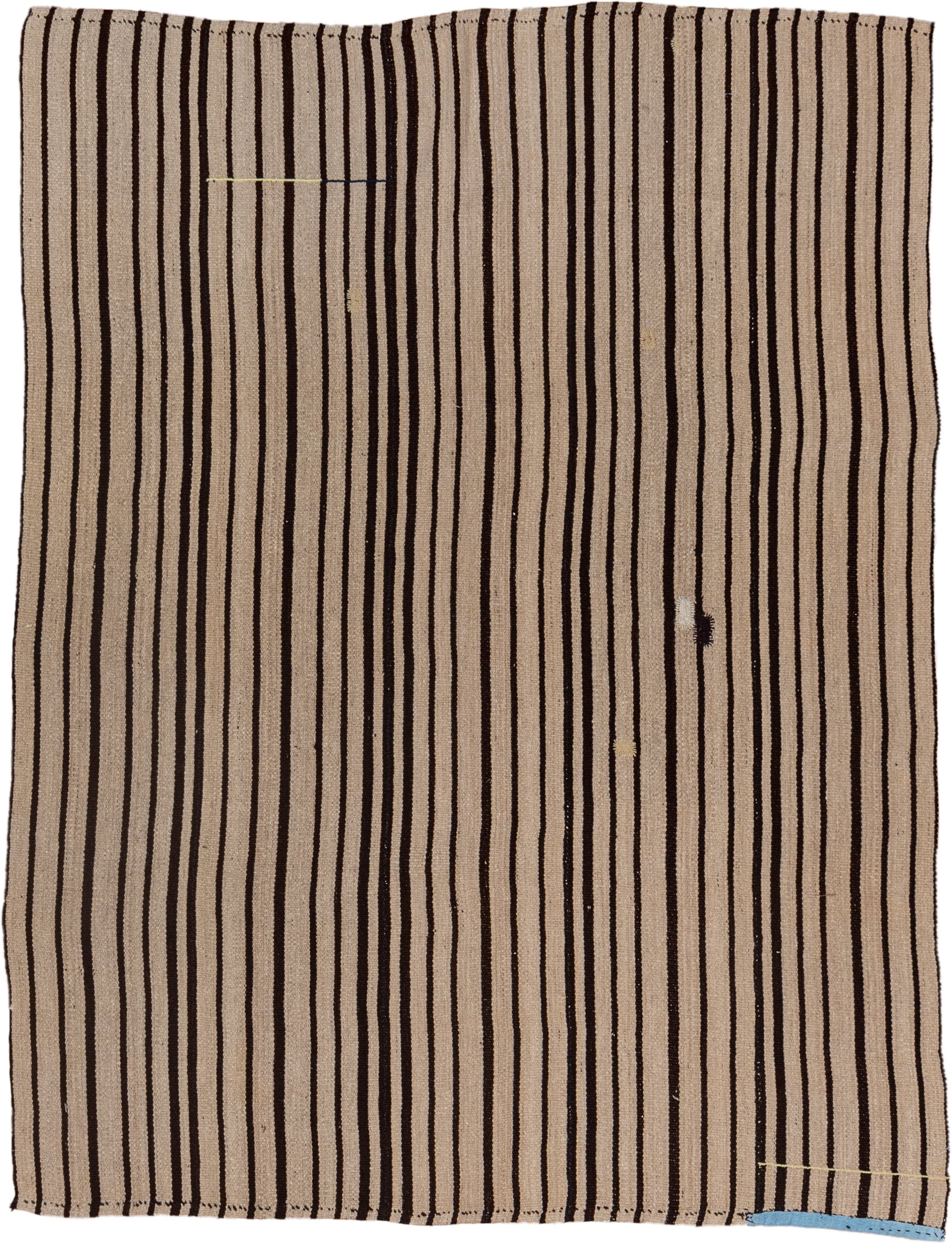 5' x 7' one-of-a-kind handmade vintage Kilim rug. Color palette: beige, dark_brown, ivory, brown
