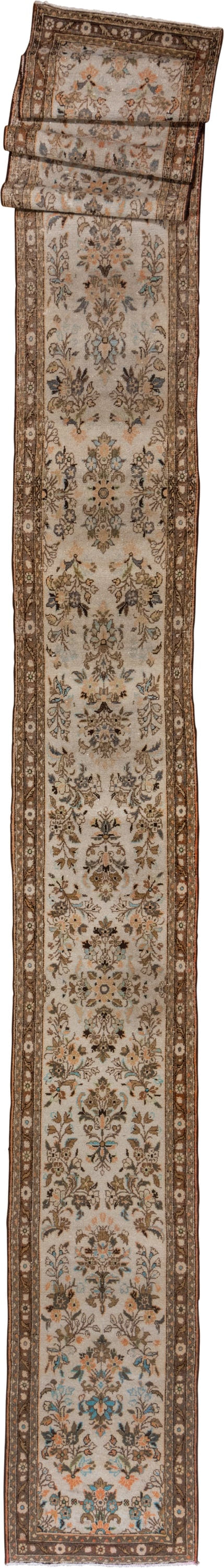2' x 25' one-of-a-kind handmade vintage Lilian runner rug. Color palette: ivory, brown, taupe, sky blue, camel, charcoal