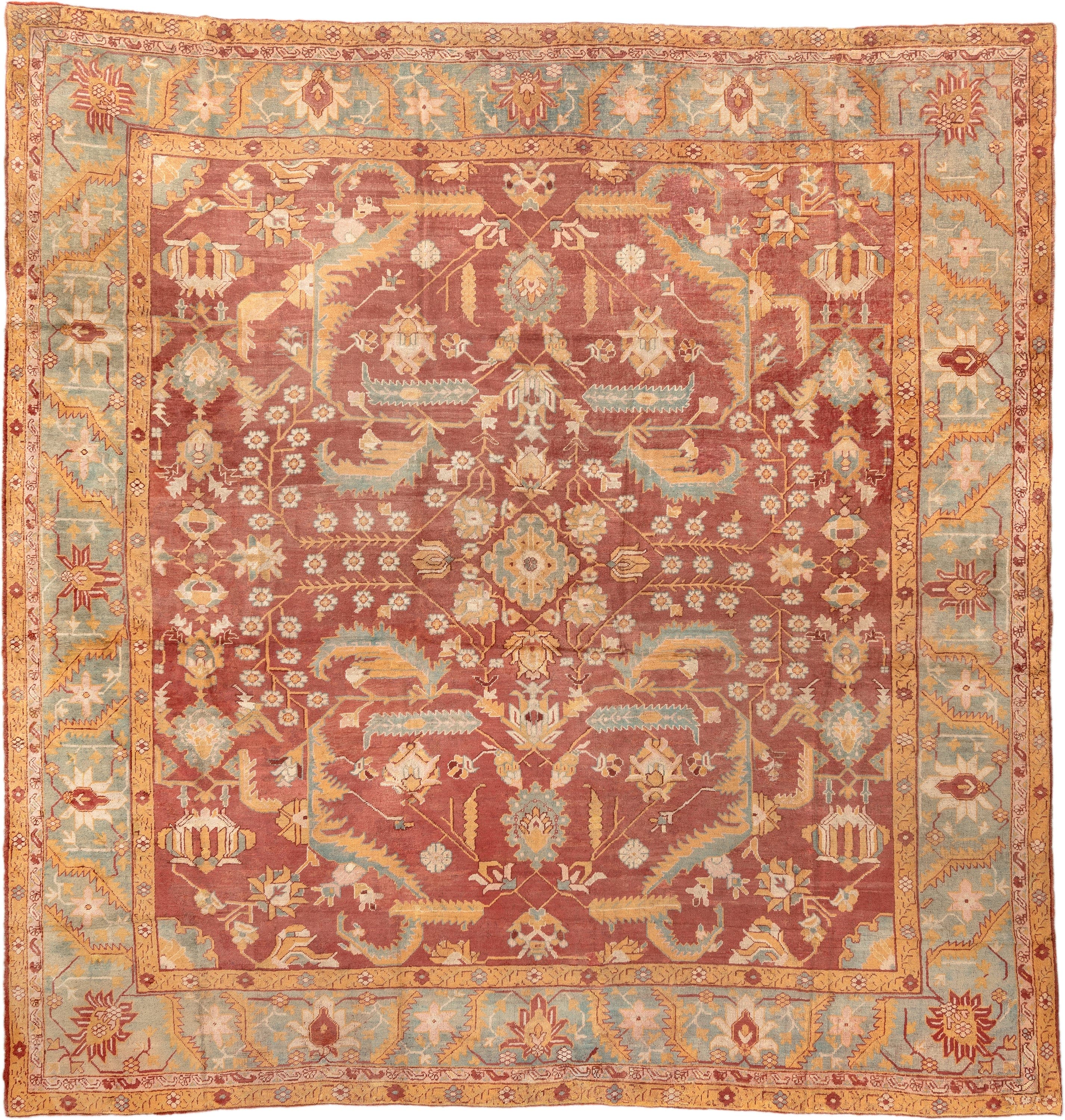 13' x 13' one-of-a-kind handmade antique Oushak oversize rug. Color palette: terracotta, aqua, gold, ivory, camel, sage