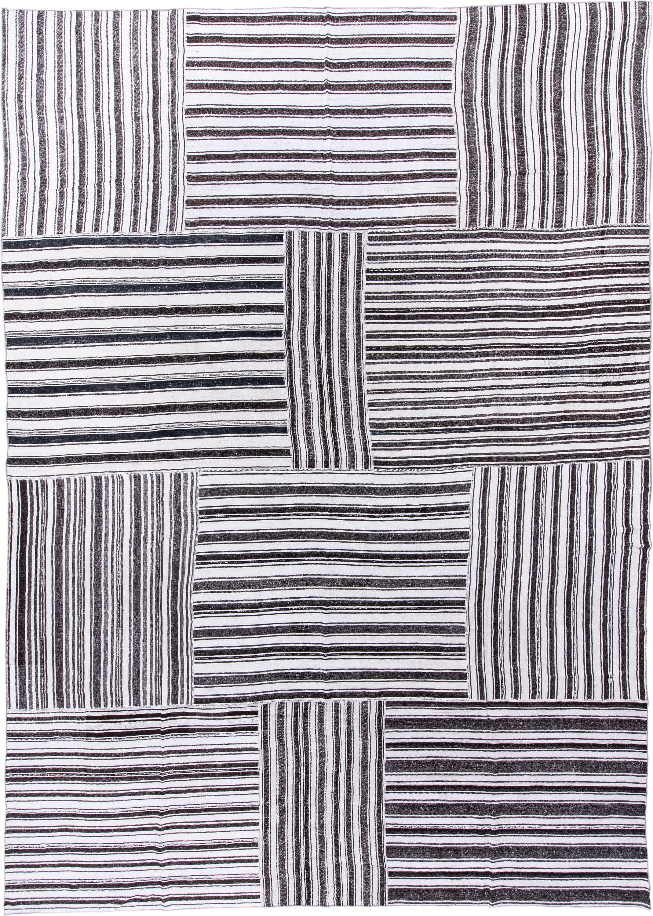 15' x 21' one-of-a-kind handmade antique Flatweave oversize rug. Color palette: ivory, charcoal, black, gray
