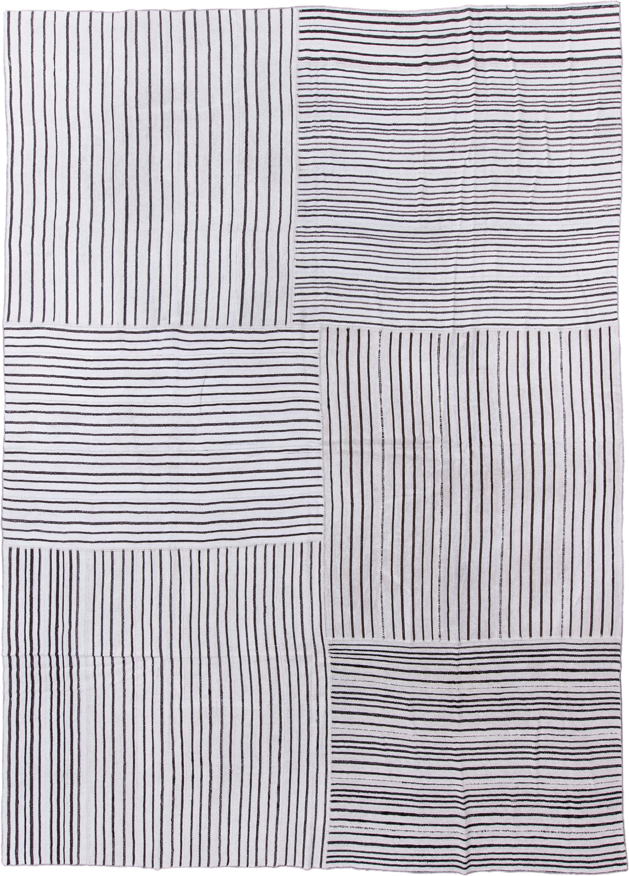 11' x 16' one-of-a-kind handmade antique Flatweave oversize rug. Color palette: ivory, charcoal, gray, black