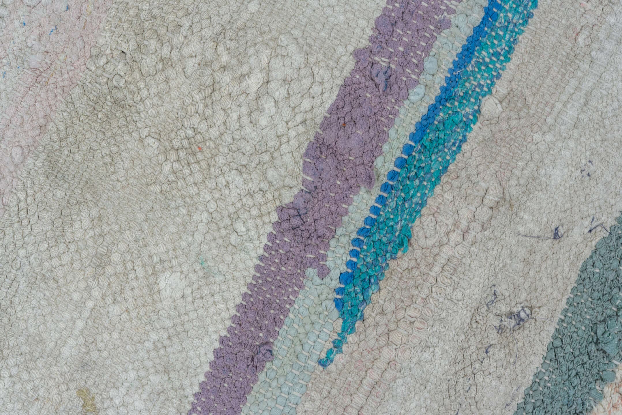 6' x 8' one-of-a-kind handmade antique Rag Rug medium size rug. Color palette: ivory, light blue, taupe, charcoal, saffron
