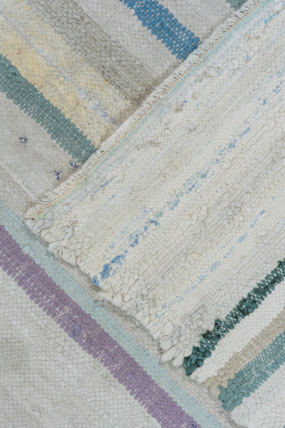 6' x 8' one-of-a-kind handmade antique Rag Rug medium size rug. Color palette: ivory, light blue, taupe, charcoal, saffron