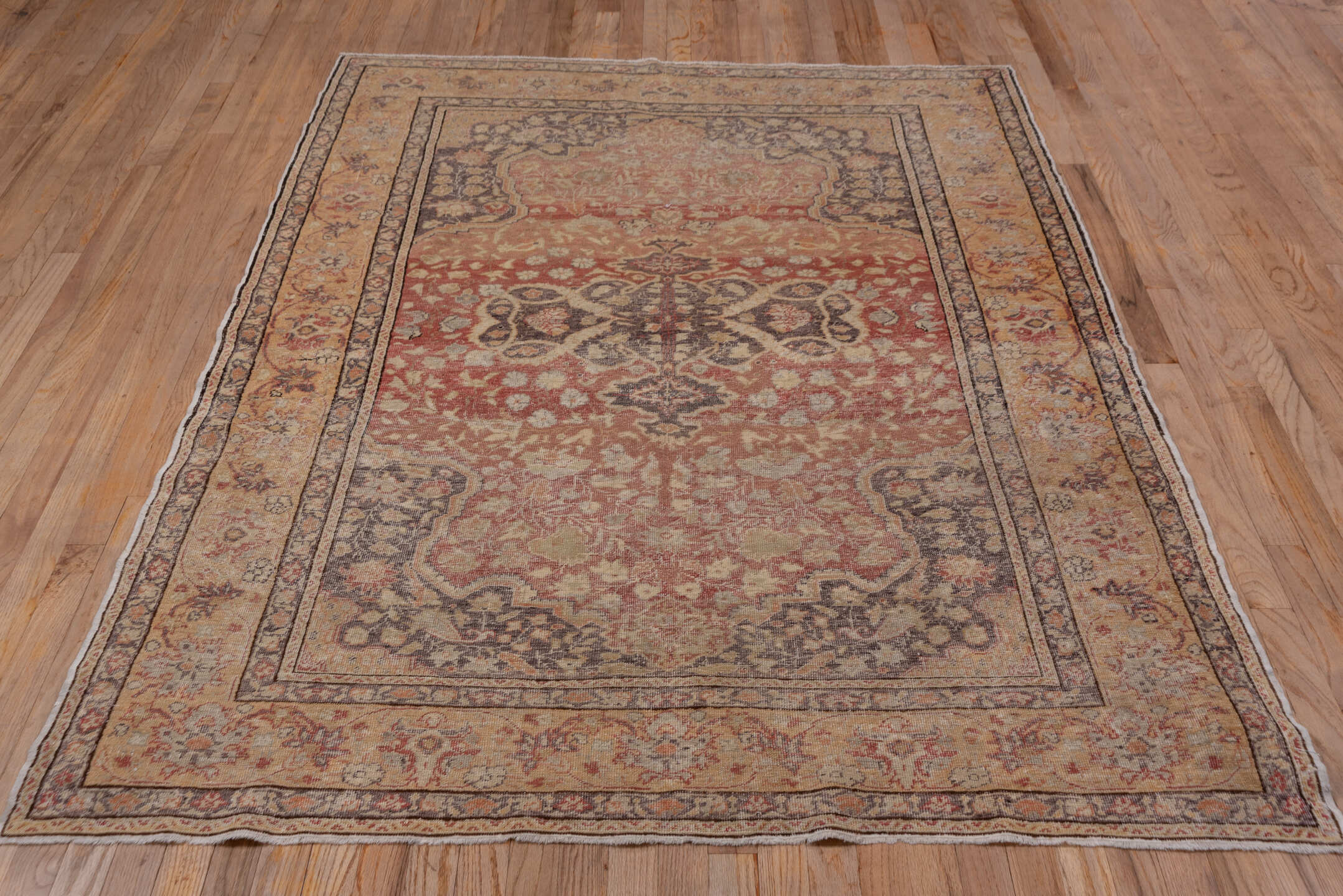 5' x 7' one-of-a-kind handmade vintage Oushak rug. Color palette: brown, gray, light gray, off-white, orange, pink, red
