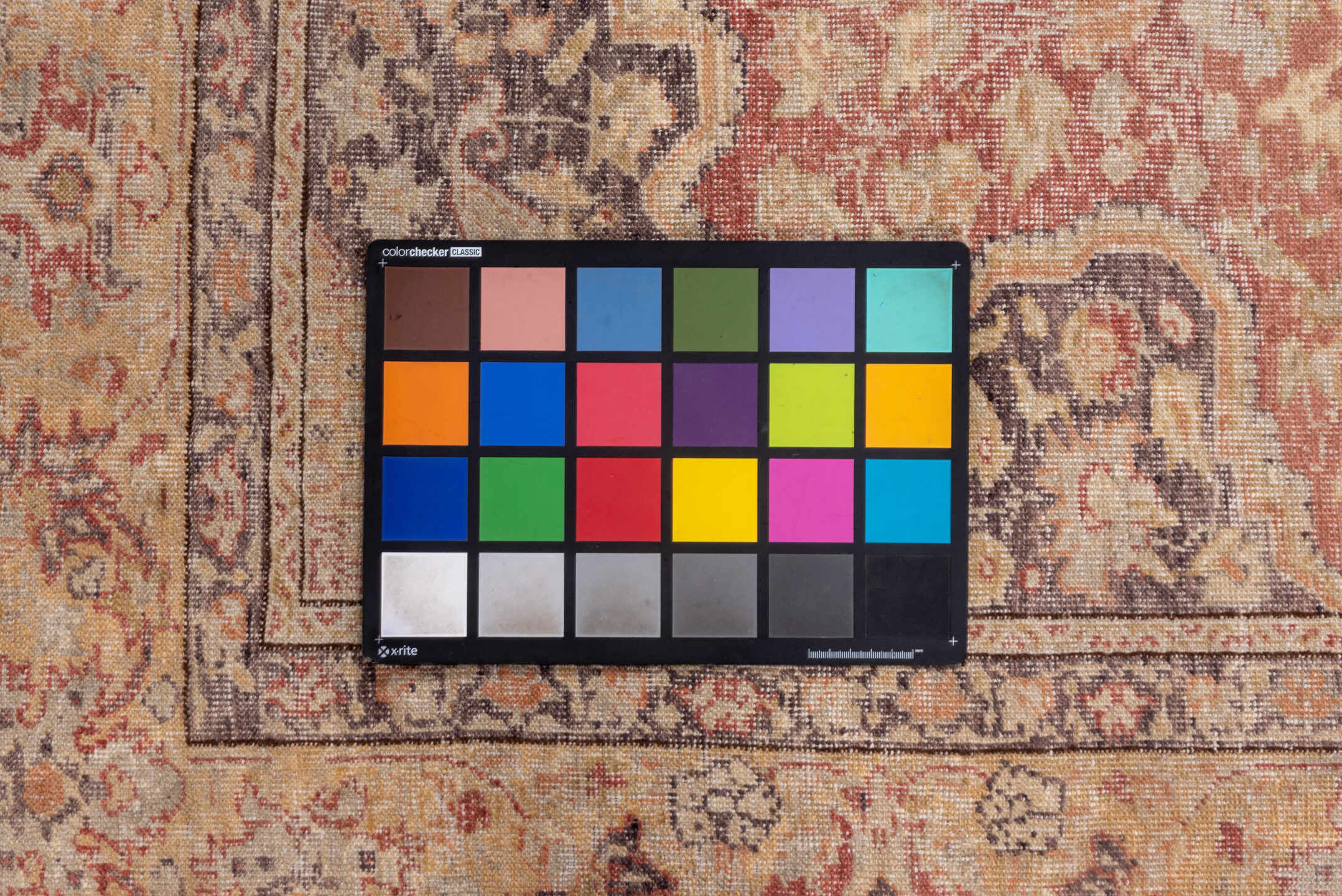 5' x 7' one-of-a-kind handmade vintage Oushak rug. Color palette: brown, gray, light gray, off-white, orange, pink, red