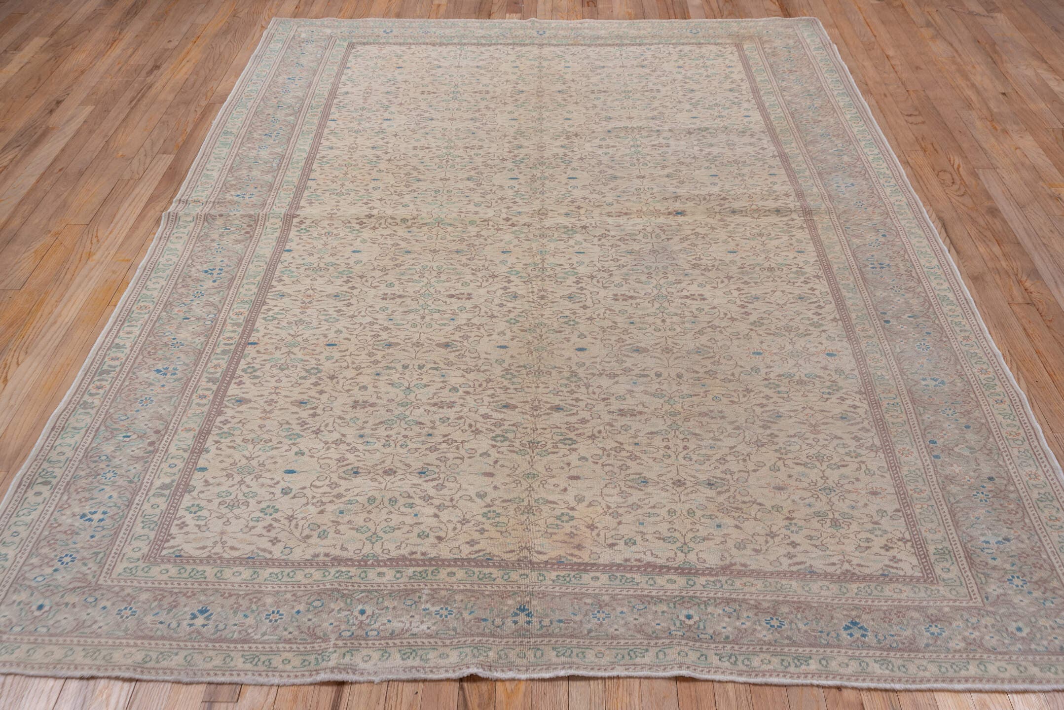 6' x 9' one-of-a-kind handmade vintage Sivas medium size rug. Color palette: ivory, taupe, pale blue, sage, beige, soft pink