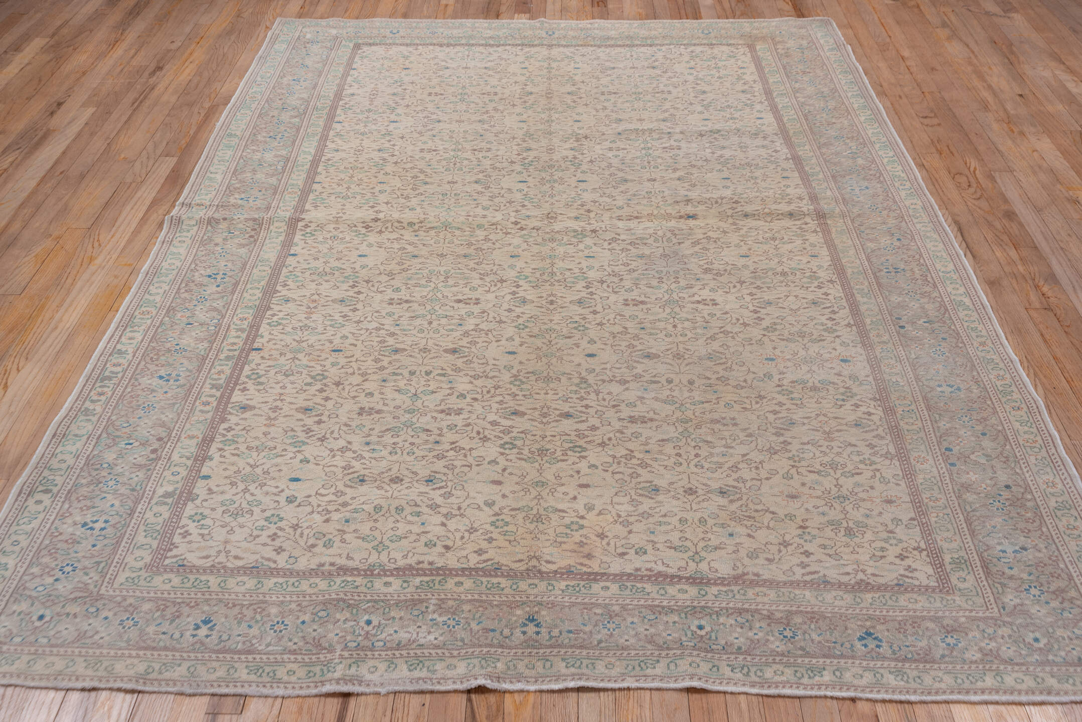 6' x 9' one-of-a-kind handmade vintage Sivas medium size rug. Color palette: ivory, taupe, pale blue, sage, beige, soft pink