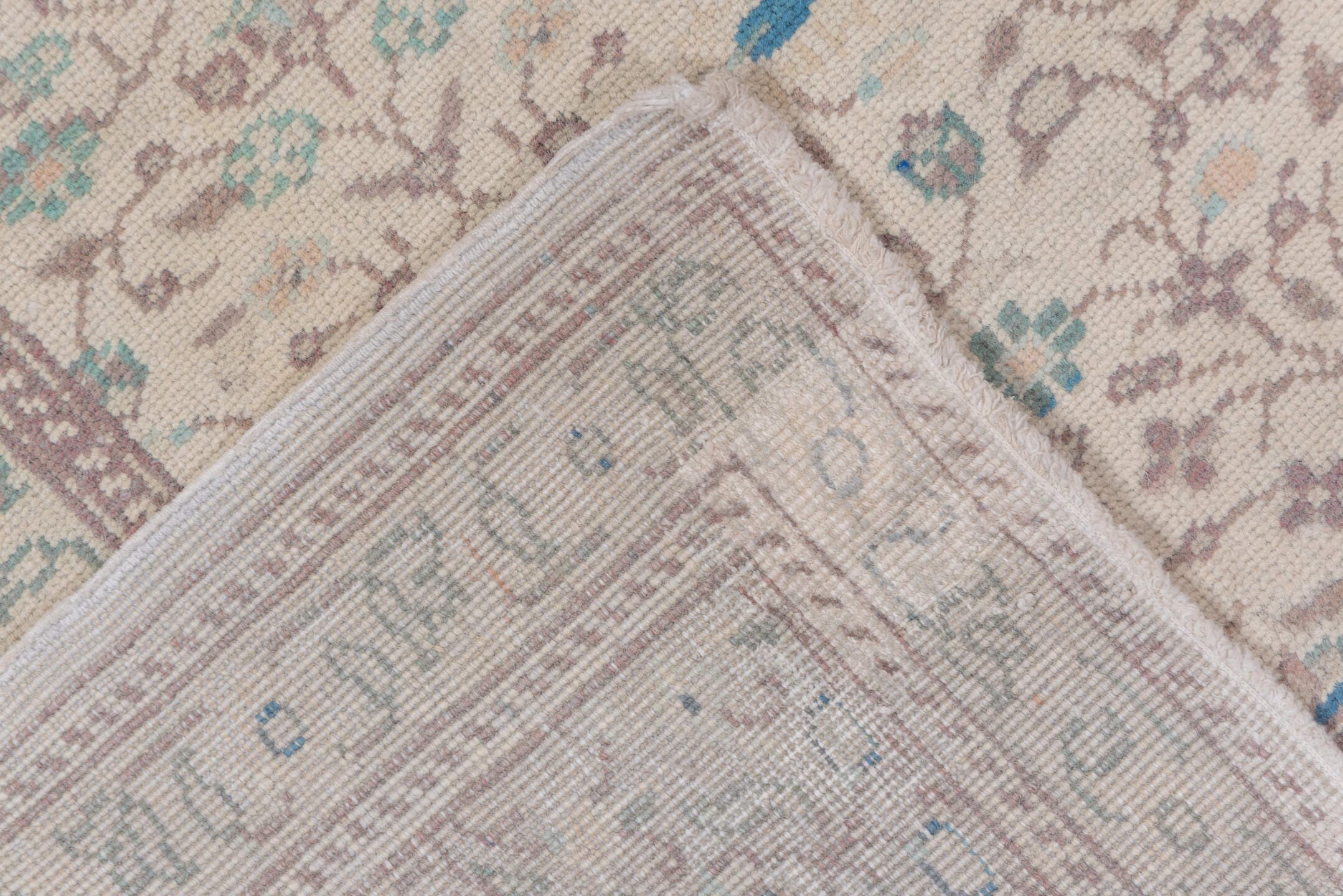 6' x 9' one-of-a-kind handmade vintage Sivas medium size rug. Color palette: ivory, taupe, pale blue, sage, beige, soft pink