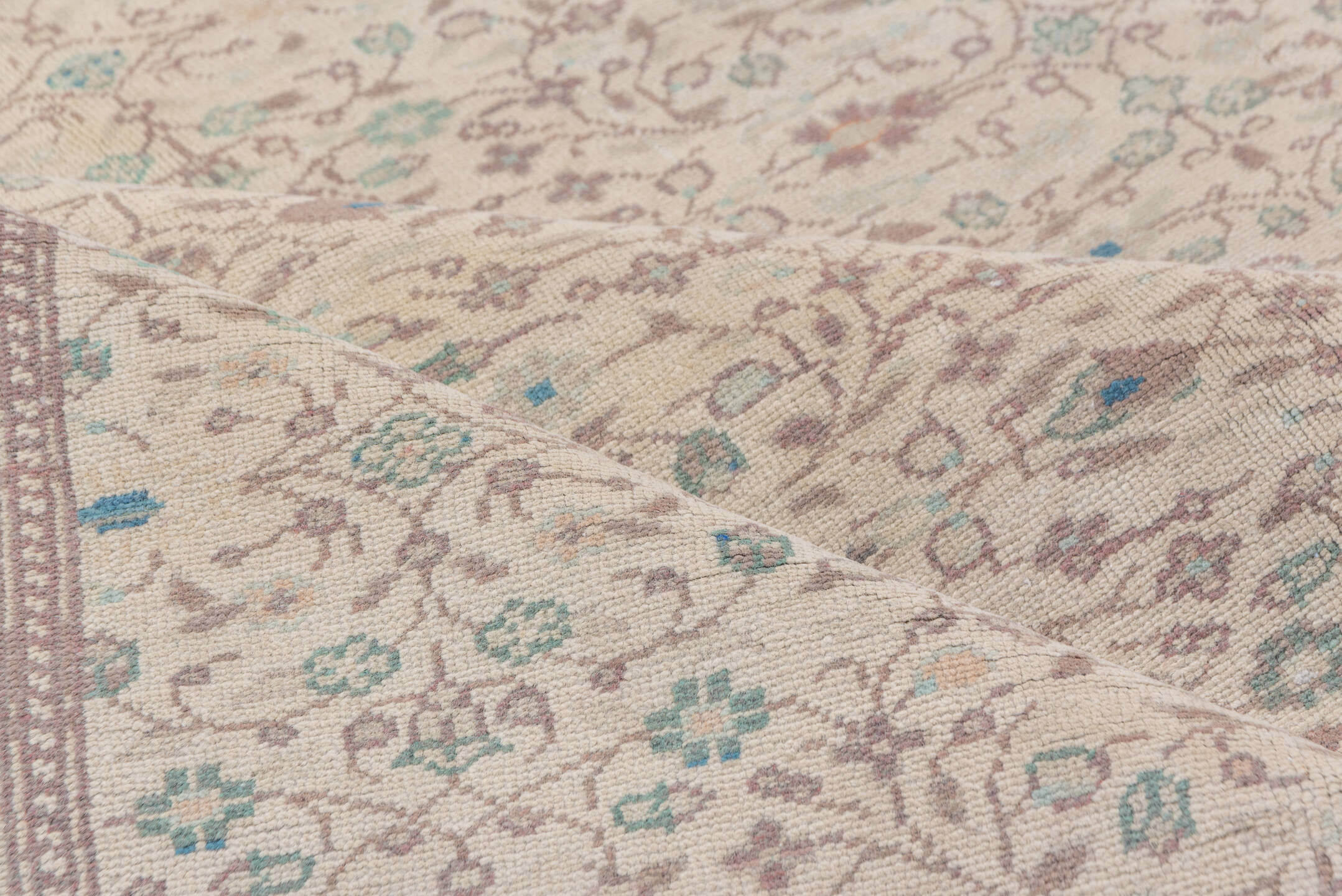 6' x 9' one-of-a-kind handmade vintage Sivas medium size rug. Color palette: ivory, taupe, pale blue, sage, beige, soft pink