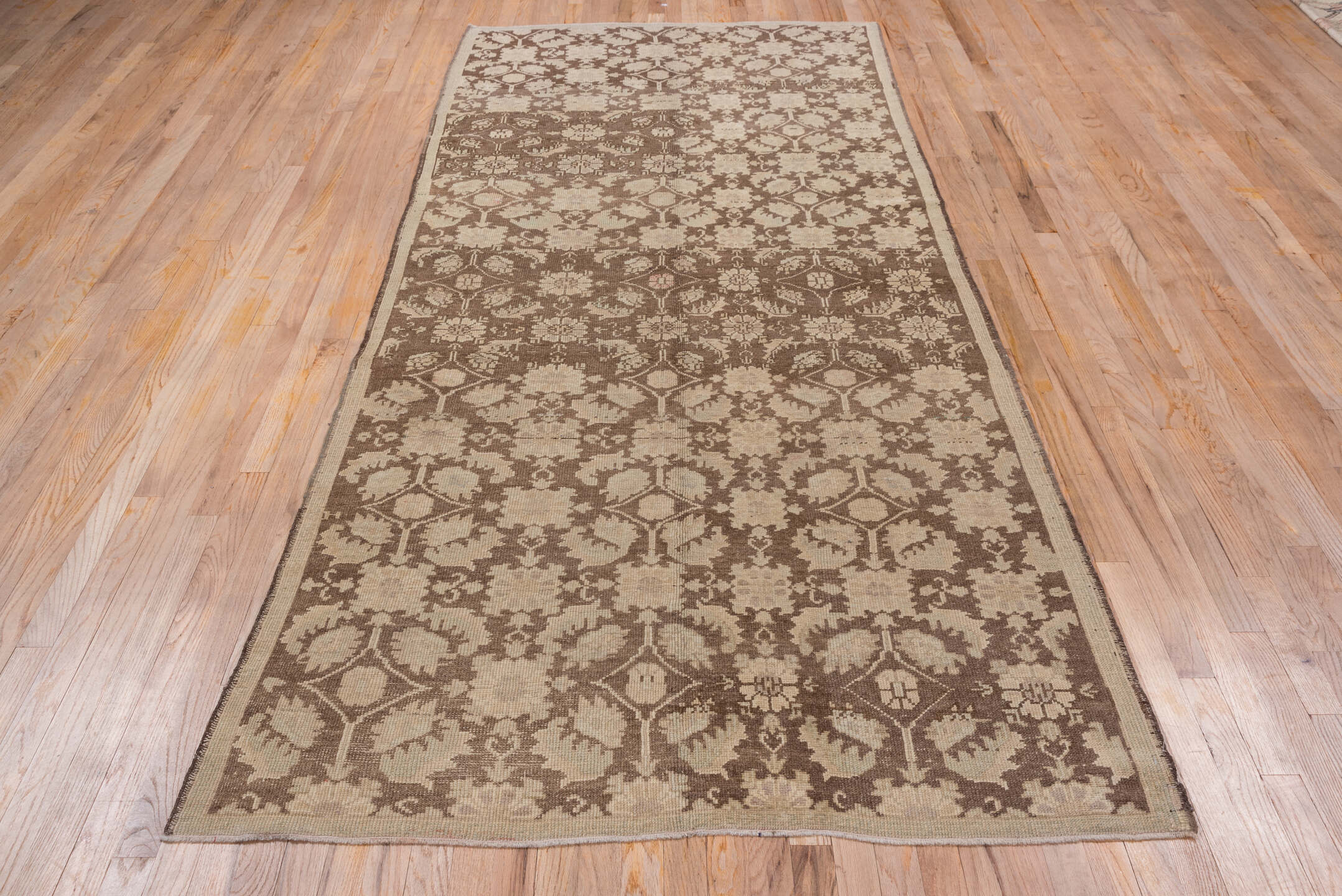 4' x 10' one-of-a-kind handmade vintage Oushak runner rug. Color palette: taupe, brown, beige, camel, ivory, gray
